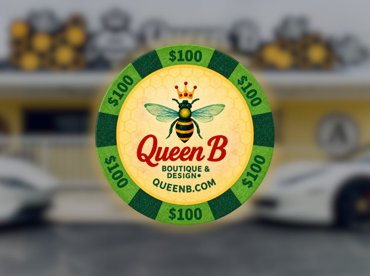 Queen B Boutique & Design gaming chip with $100 value and bee logo.