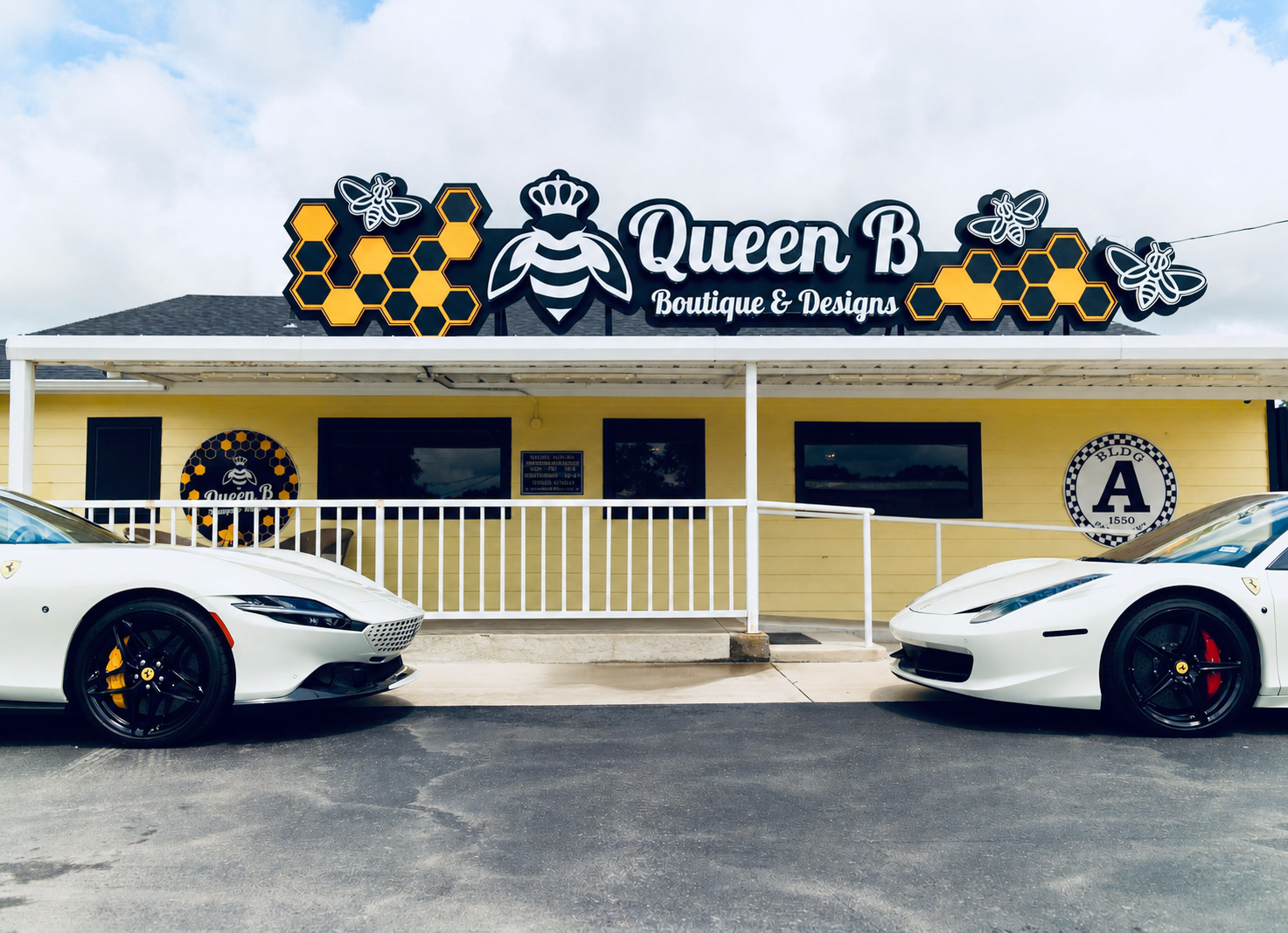 Queen B Boutique & Designs storefront with luxury cars, Double E Lifestyle retail experience in