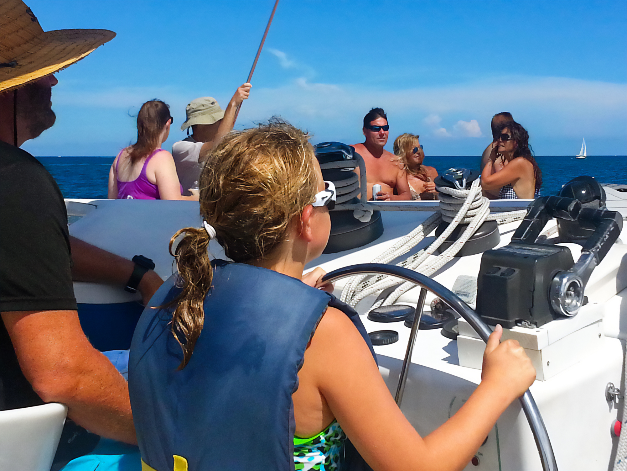 Guests enjoying the view on the catamaran