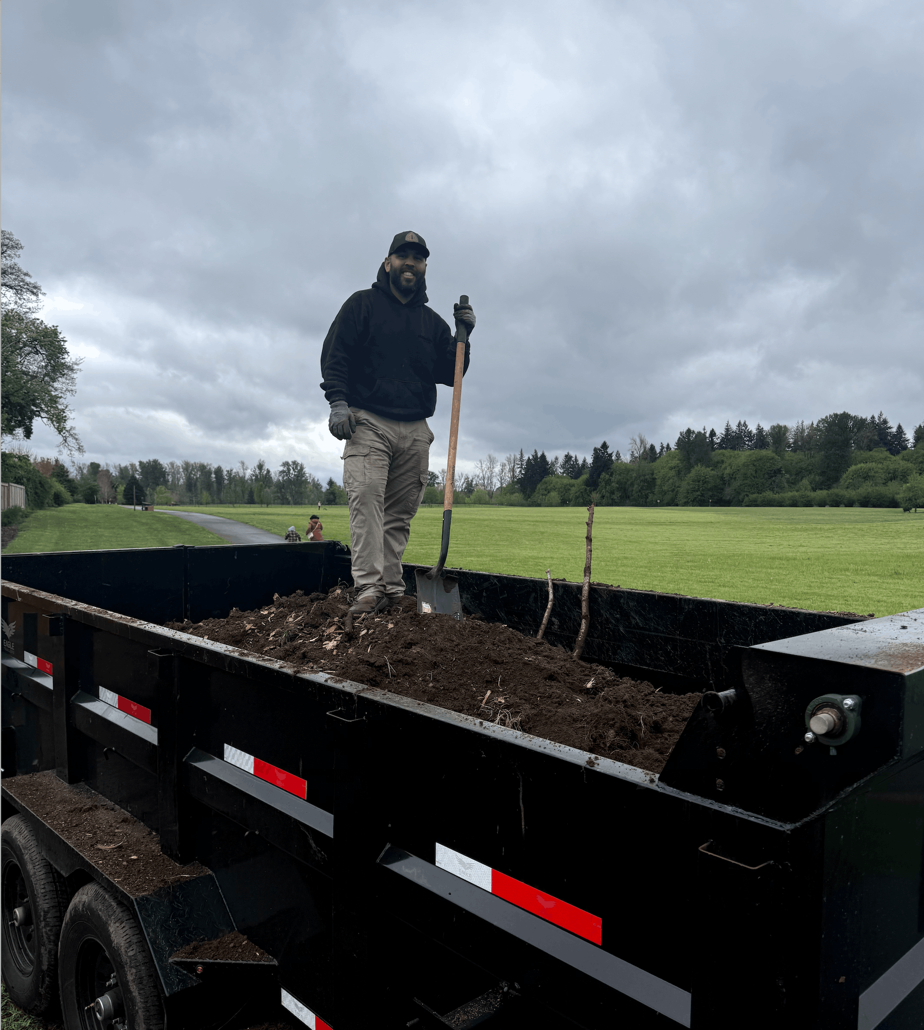 Brandon loading debris into the trailer in Salem OR