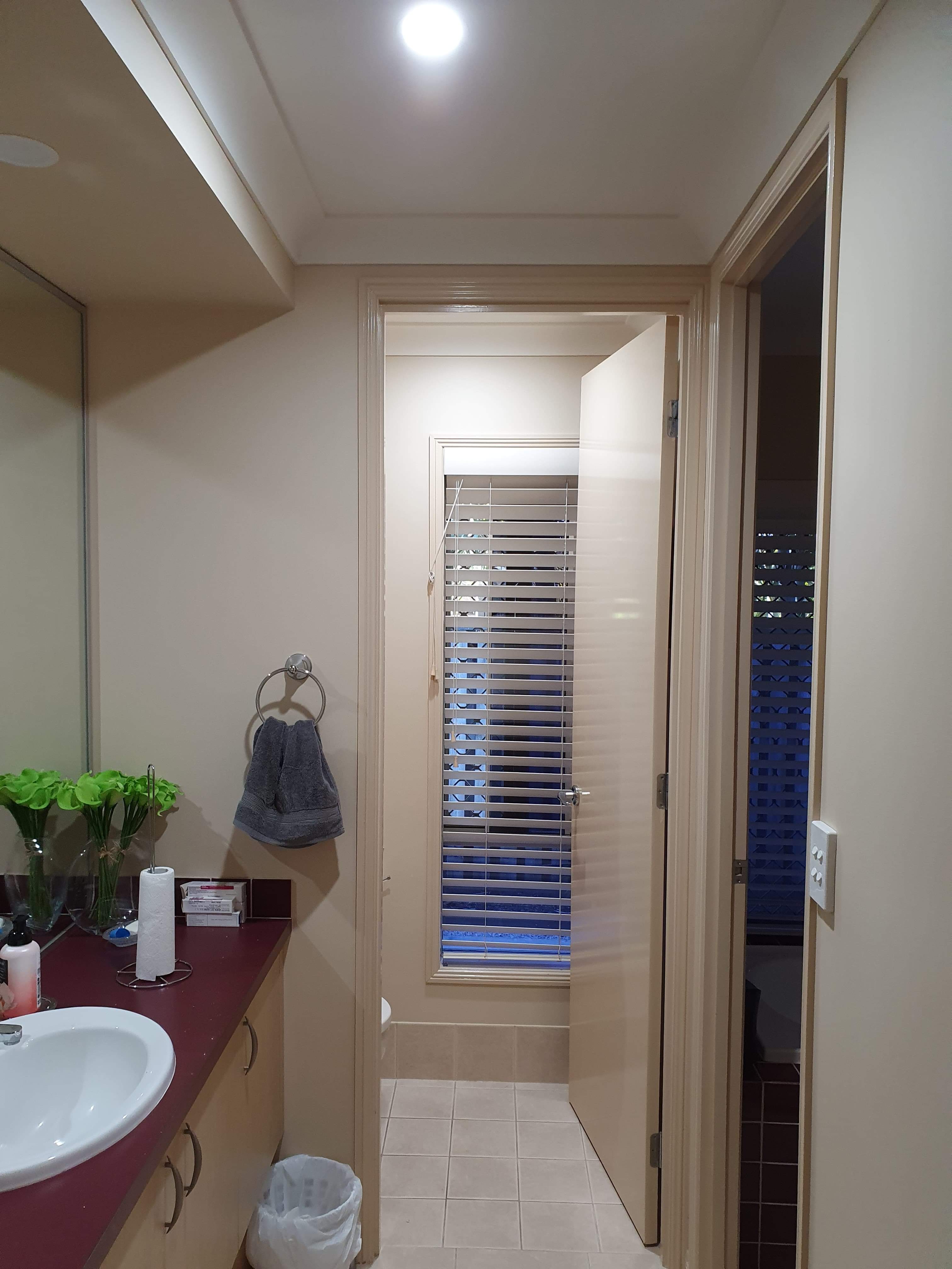 Bright bathroom vanity after Redilight