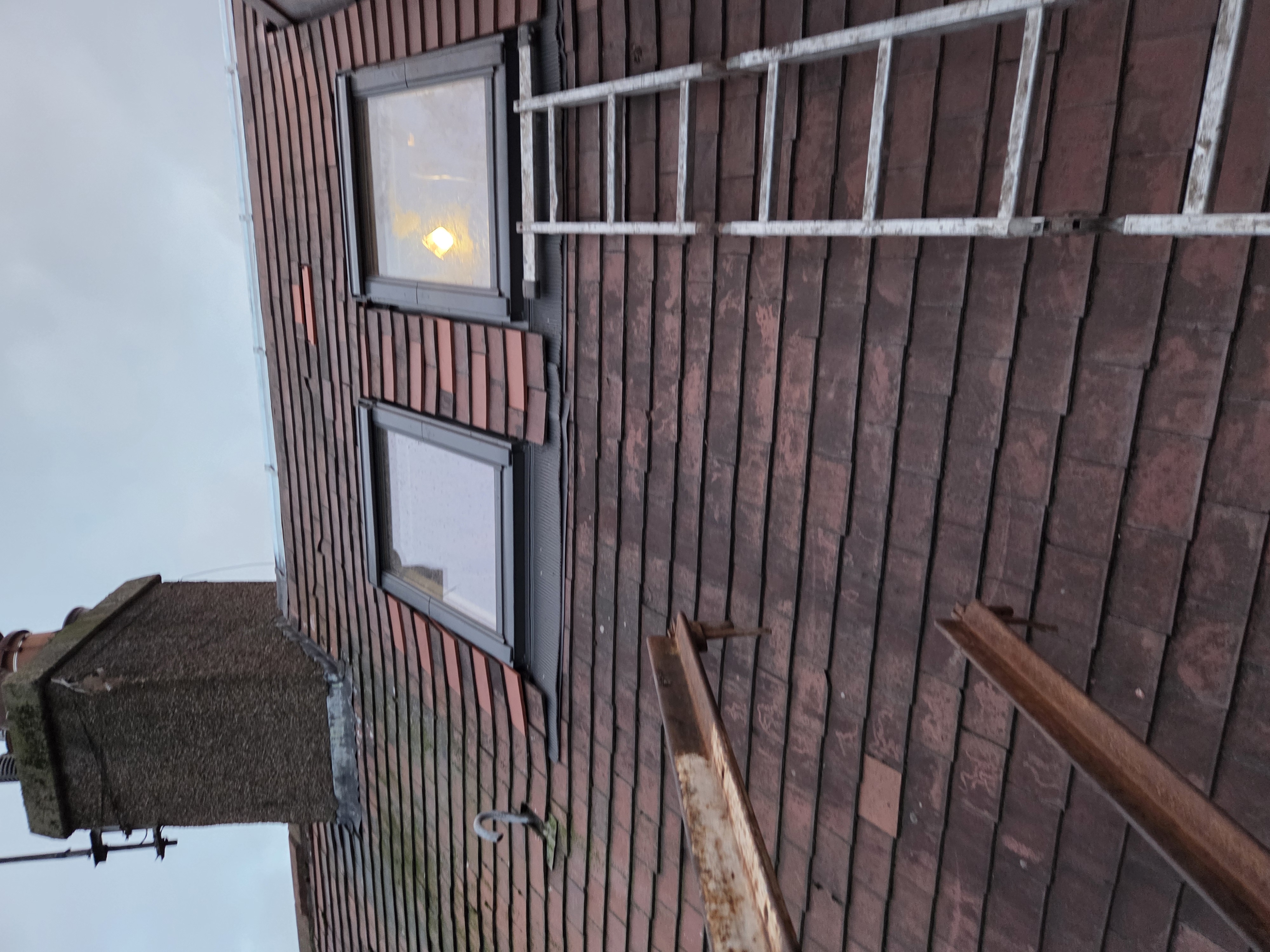 Roofing team at work