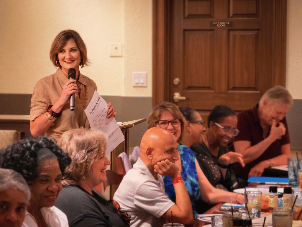 Carol Mitchell hosting a local Medicare educational seminar