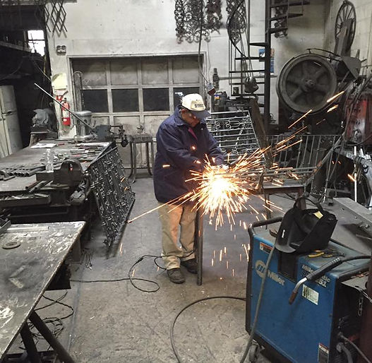 Expert welder fabricating custom ironwork