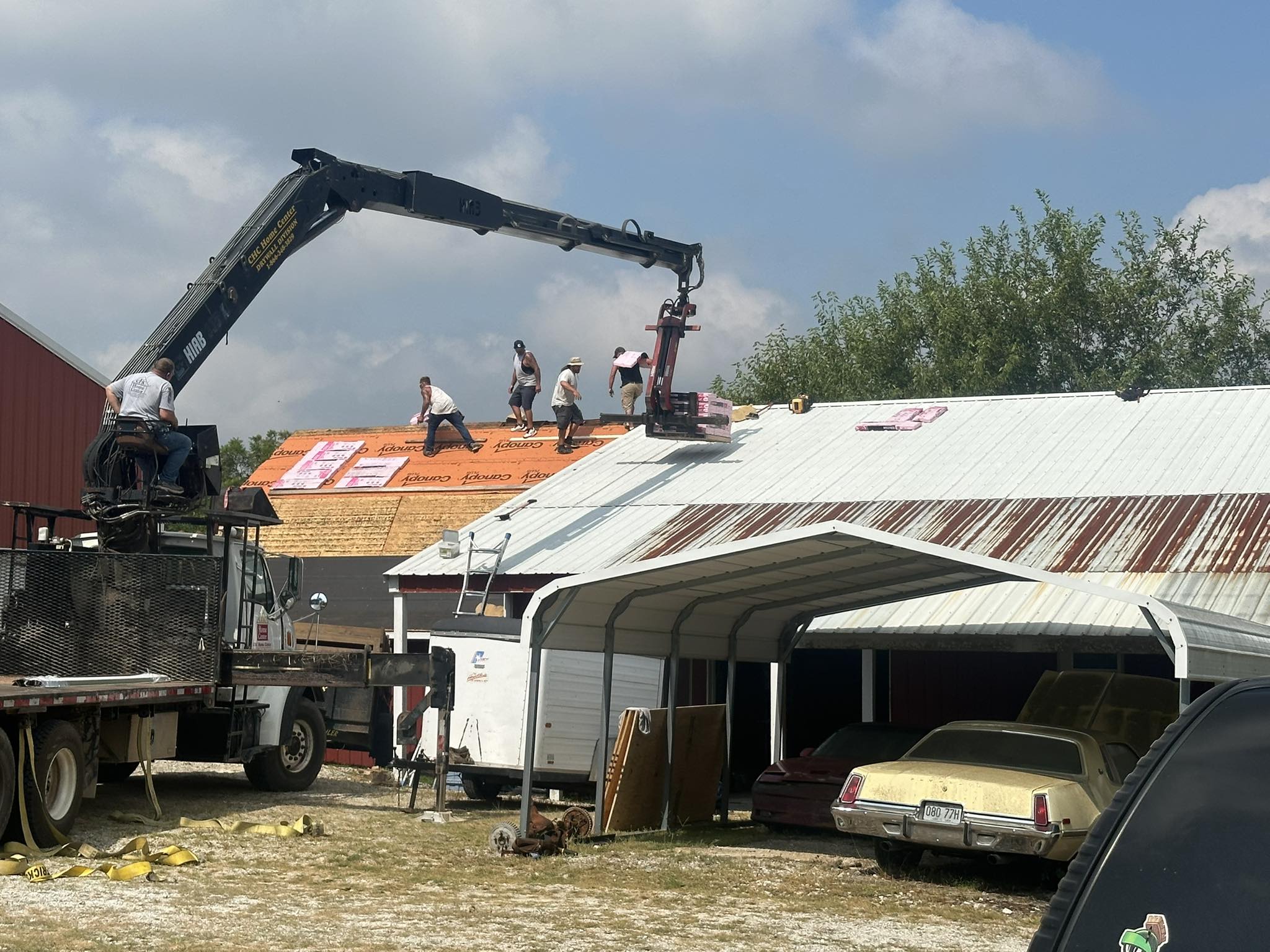 Construction team working on a roof