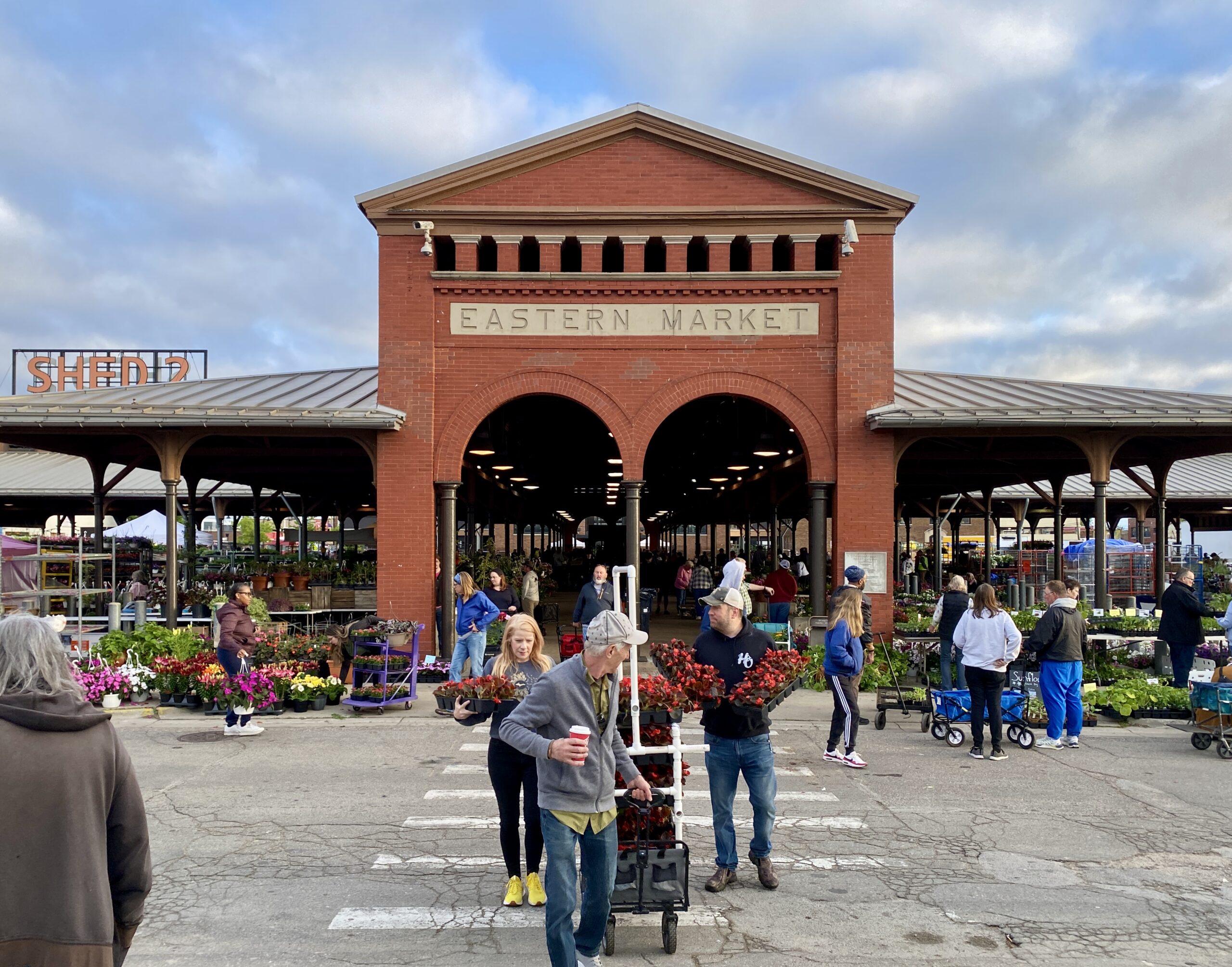 Eastern Market in Detroit with crowds and historic market sheds