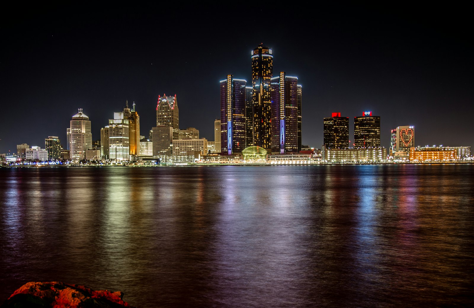 Detroit cityscape at night seen from across the river
