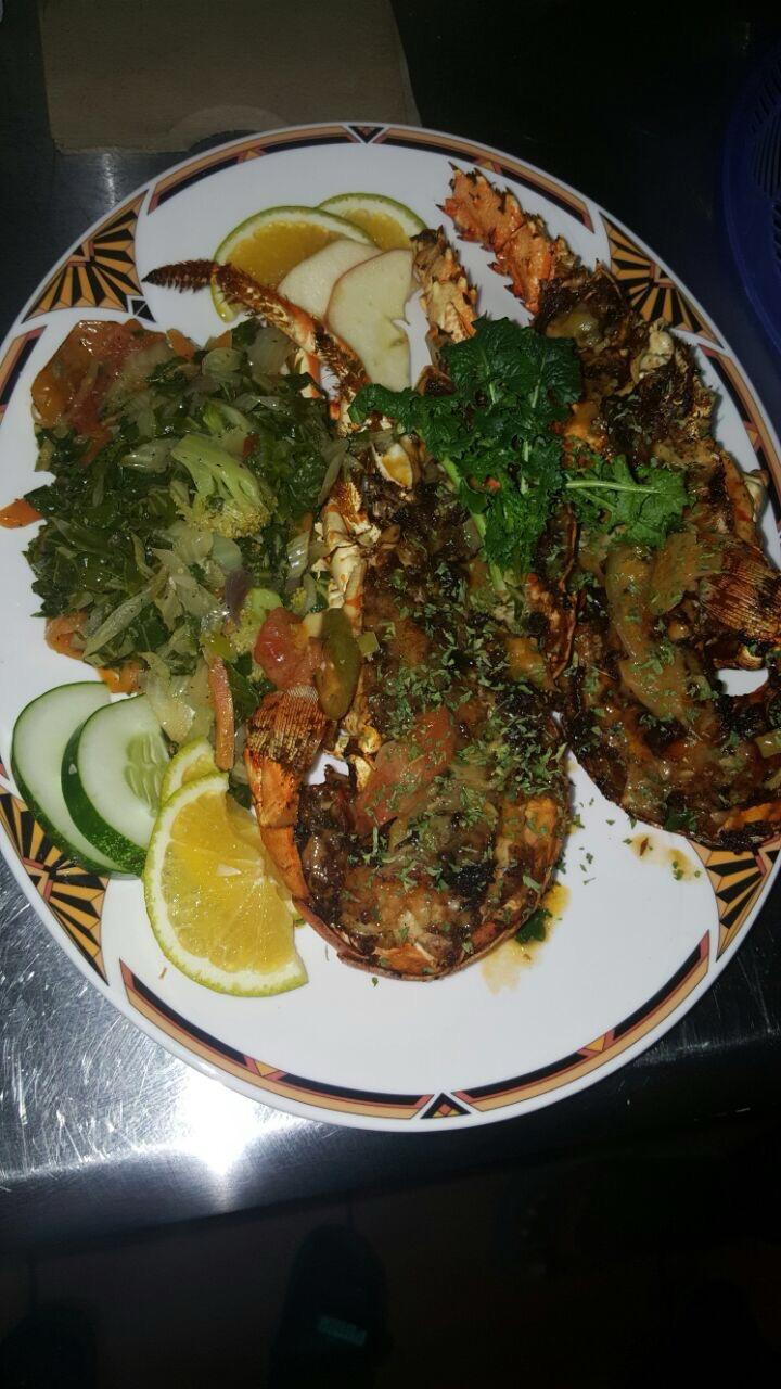 Gempie's Gazebo dish - grilled lobster with herbs and salad