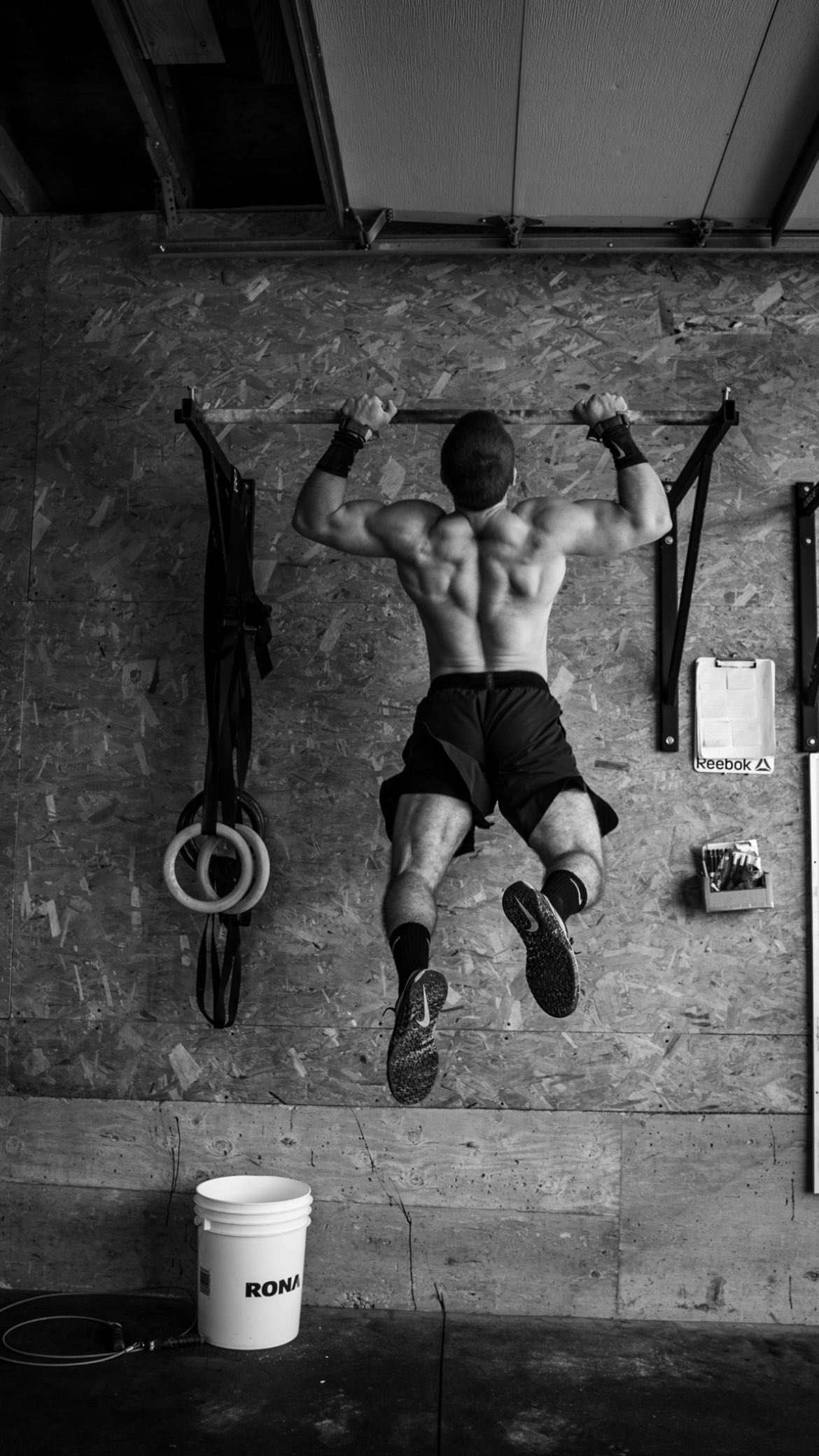 Anthony Gnoato, CrossFit athlete doing pull-ups and patient at Health Sciences Lab