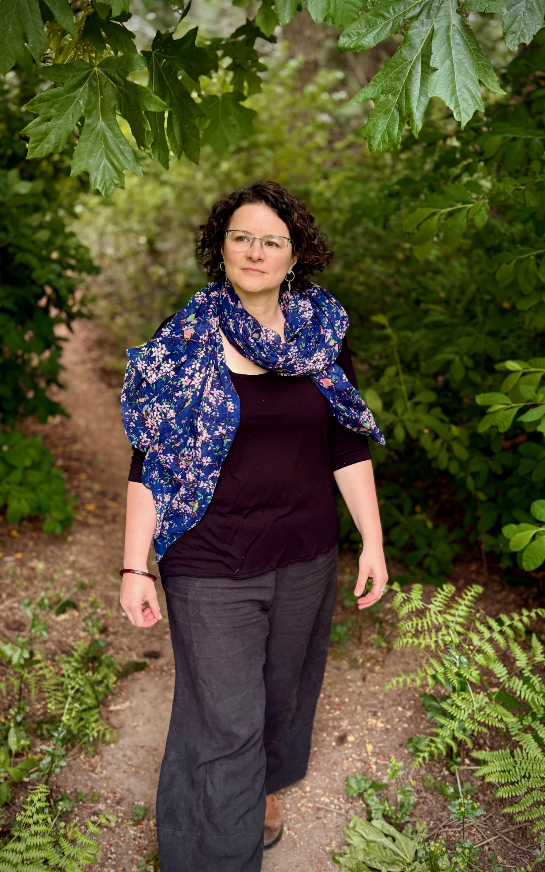 Vanya Laporte, counsellor, standing in a nature setting near Victoria, BC.