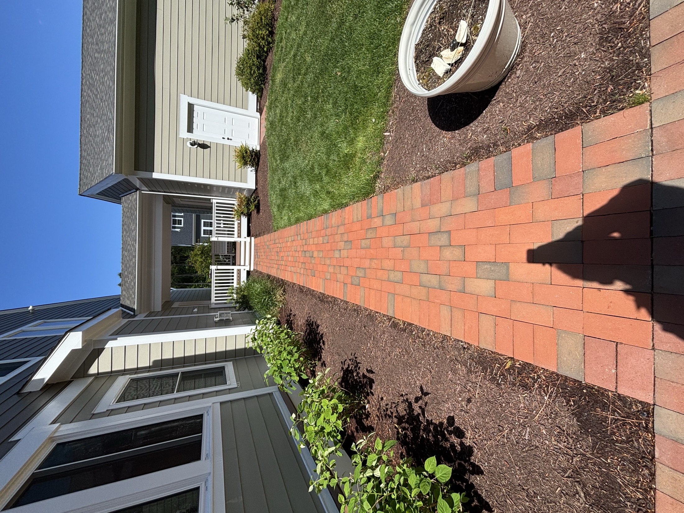 Clean brick paver walkway after pressure washing at an Easton MD home on Maryland's Eastern Shore