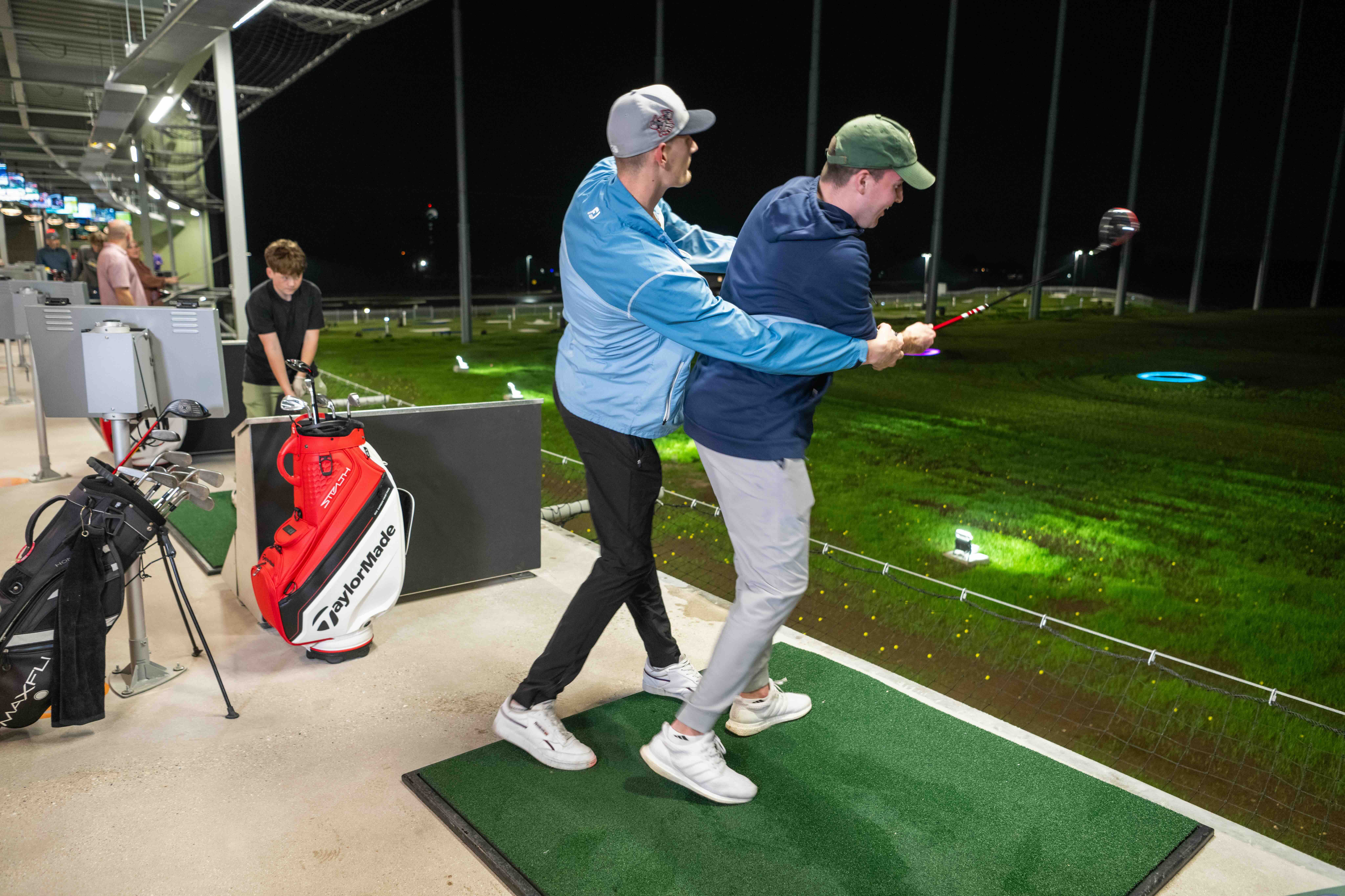 Adult group golf lessons at PinSocial DeForest