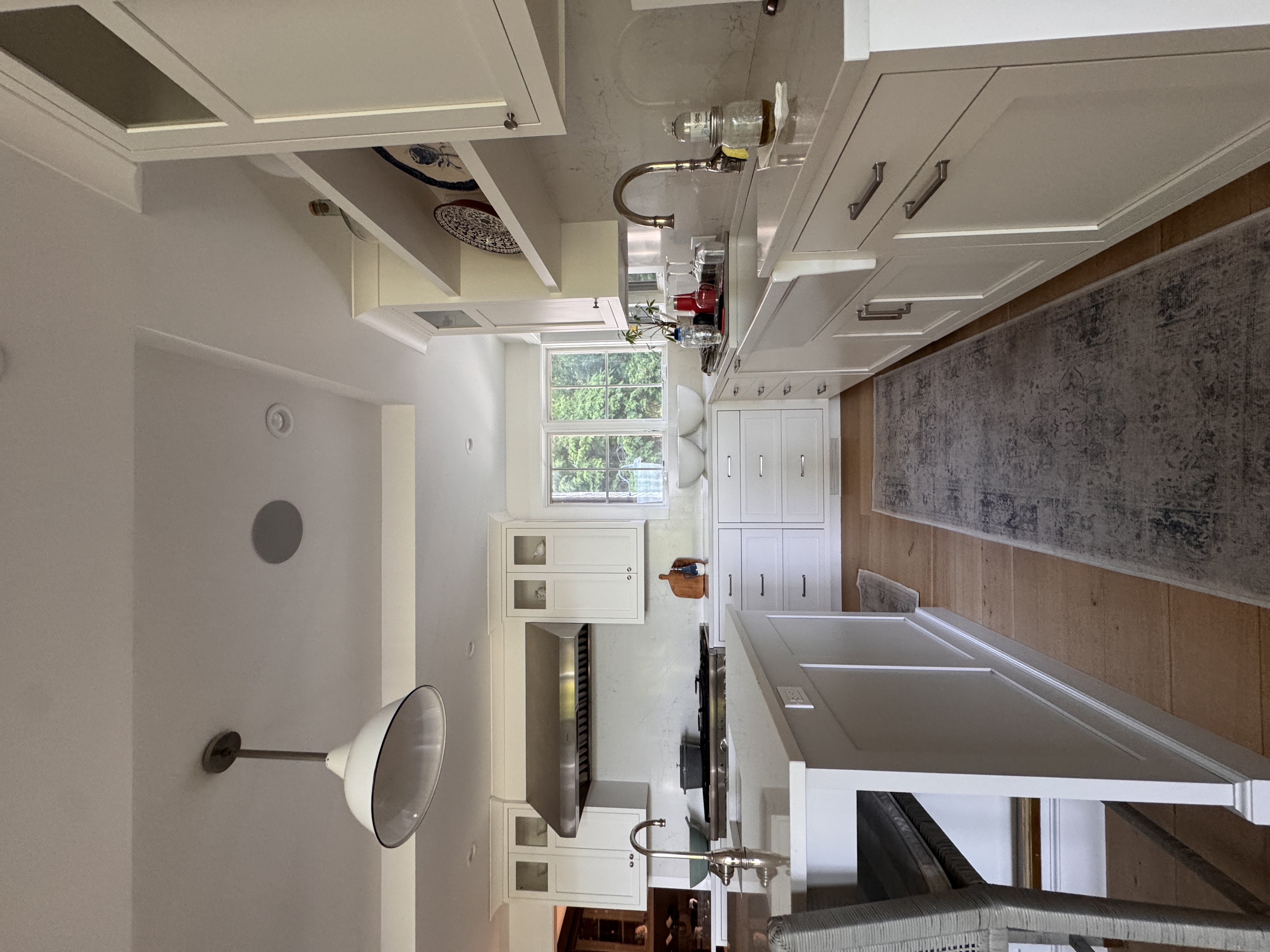 Kitchen sink area cabinetry by Custom Furniture and Design, Bantam CT