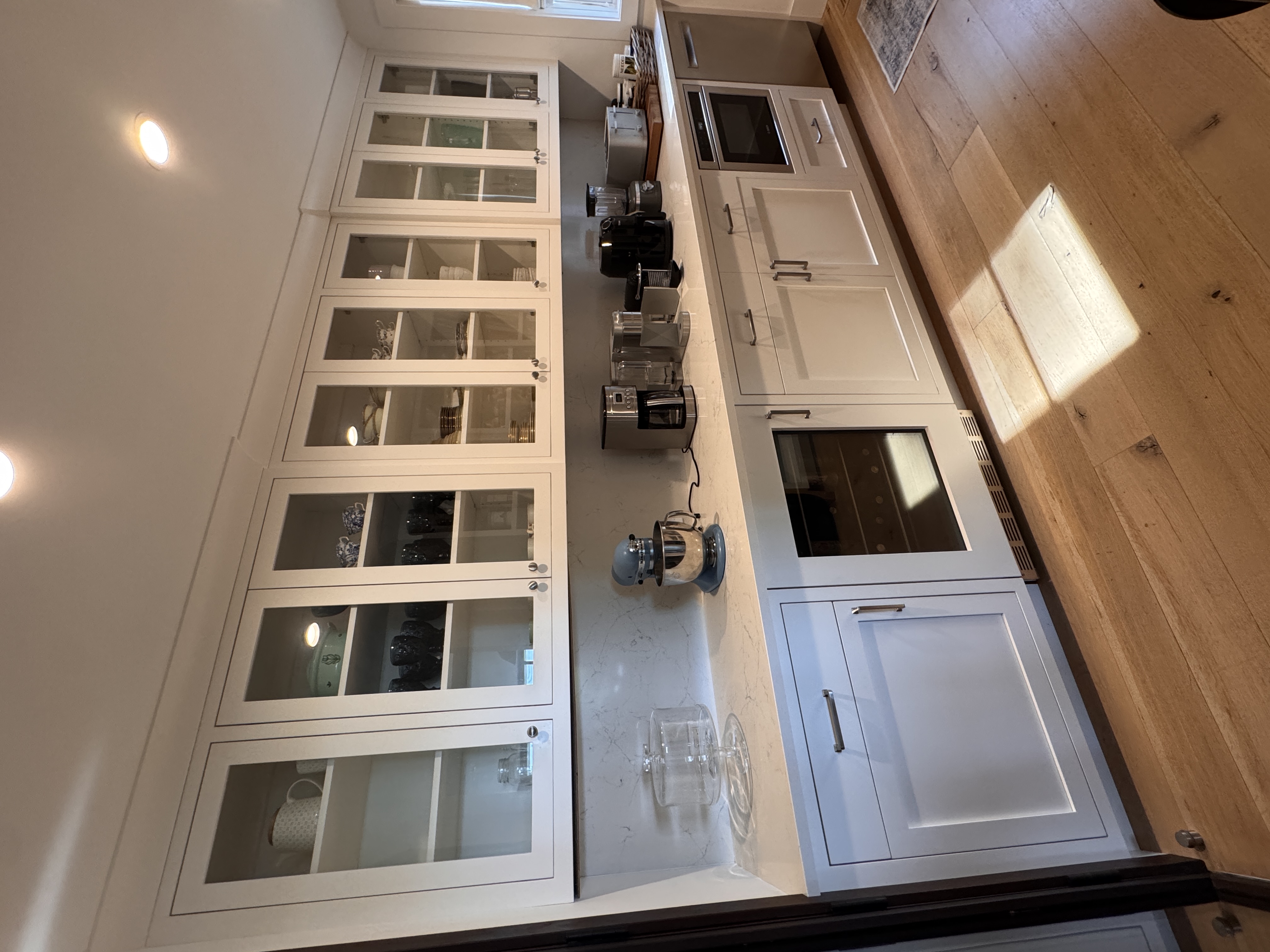 Glass display cabinetry by Custom Furniture and Design, Bantam CT