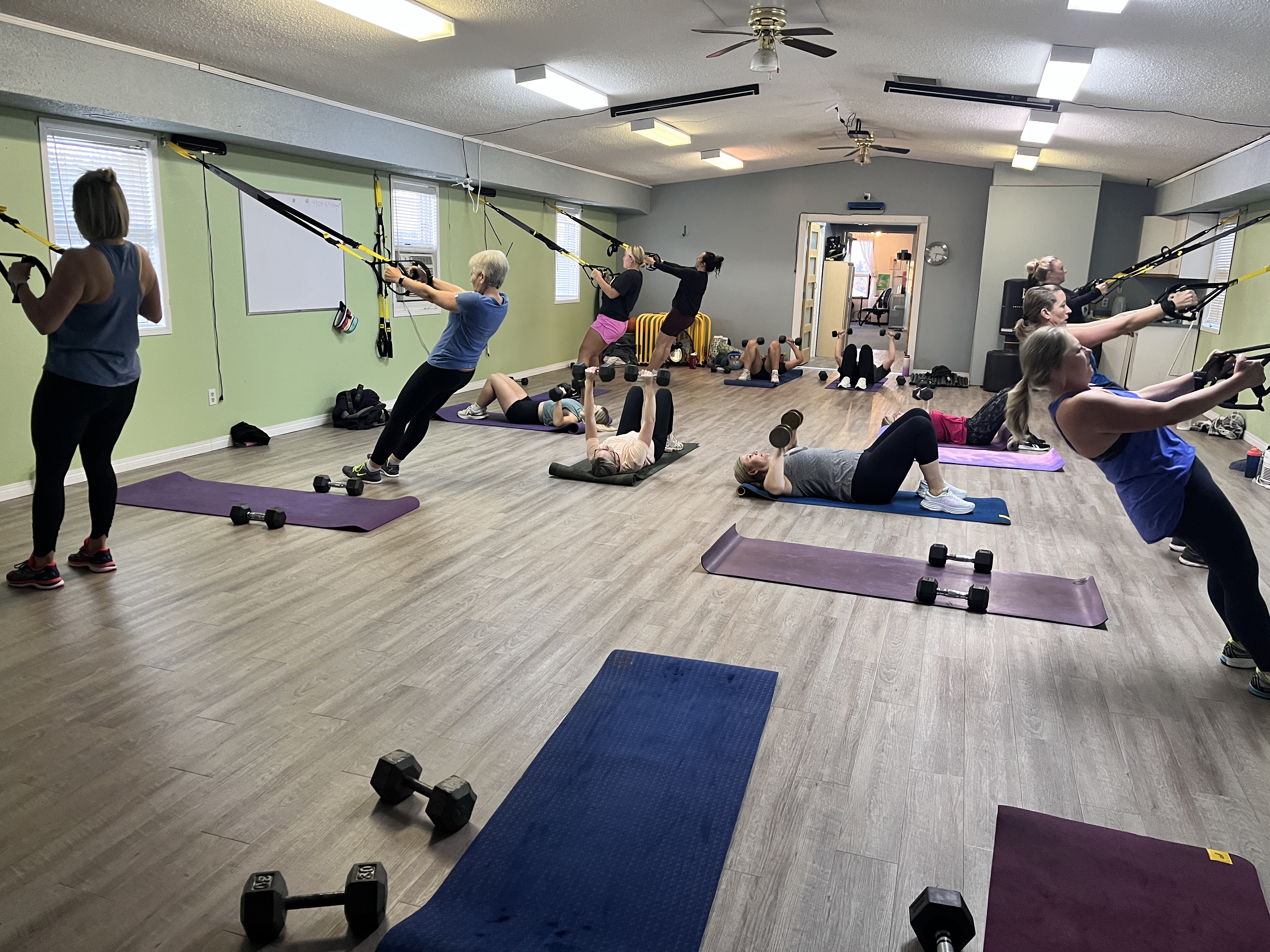 Pam leading an early morning fitness class in Drayton Valley