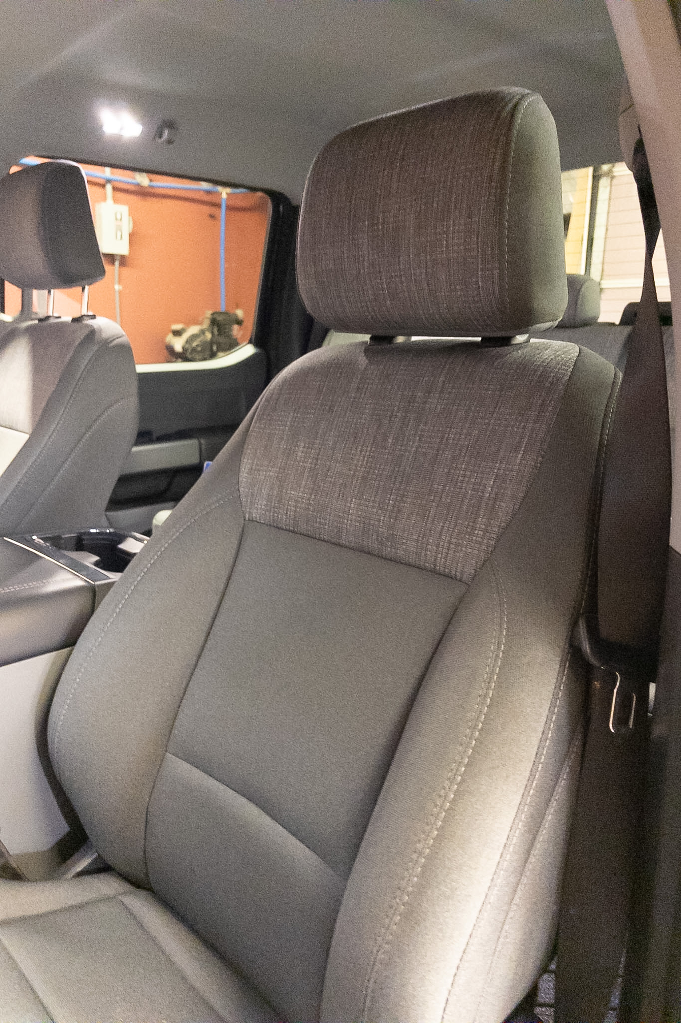 Factory cloth seat before Katzkin