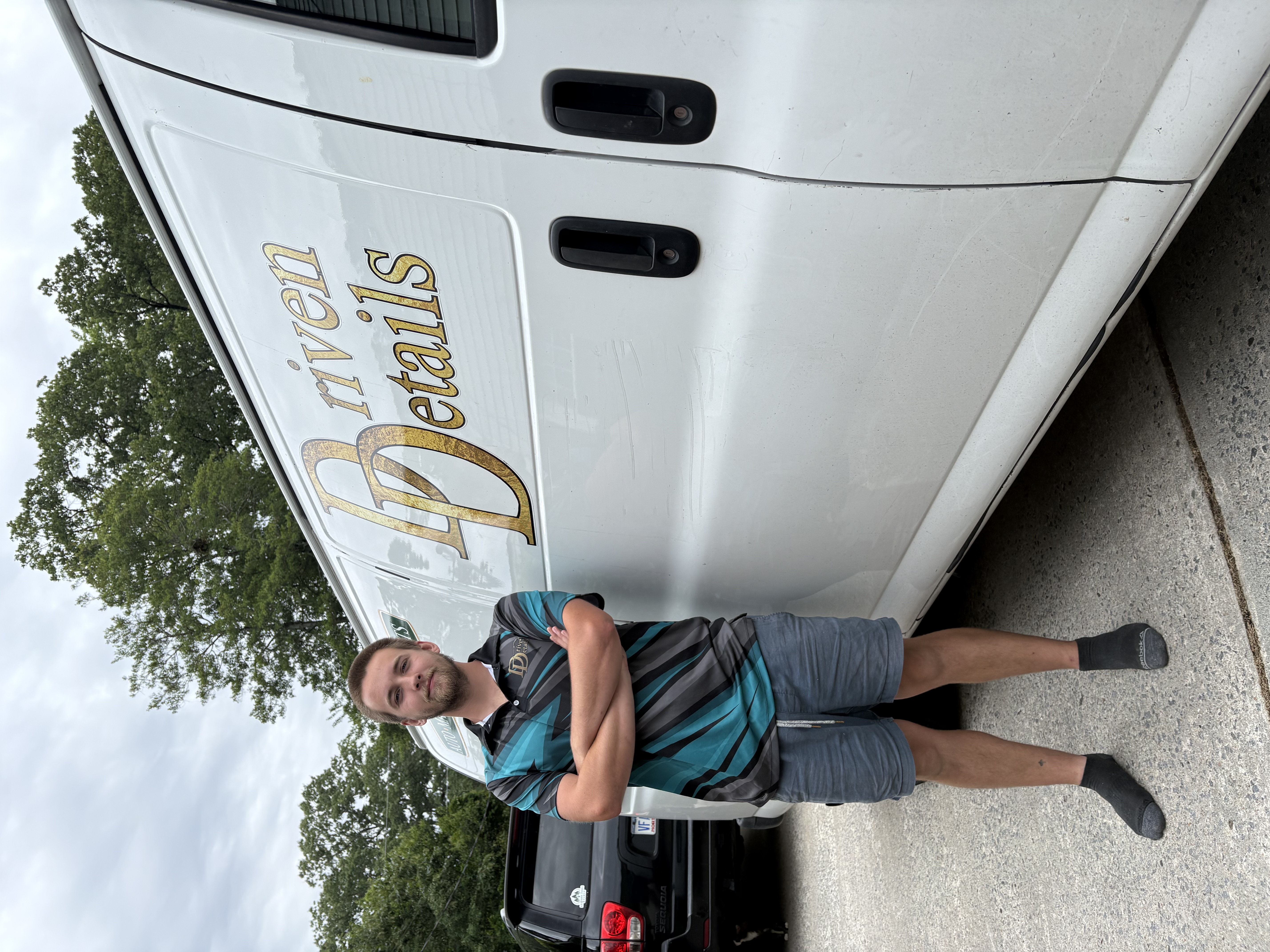 Gabe with Driven Details Van