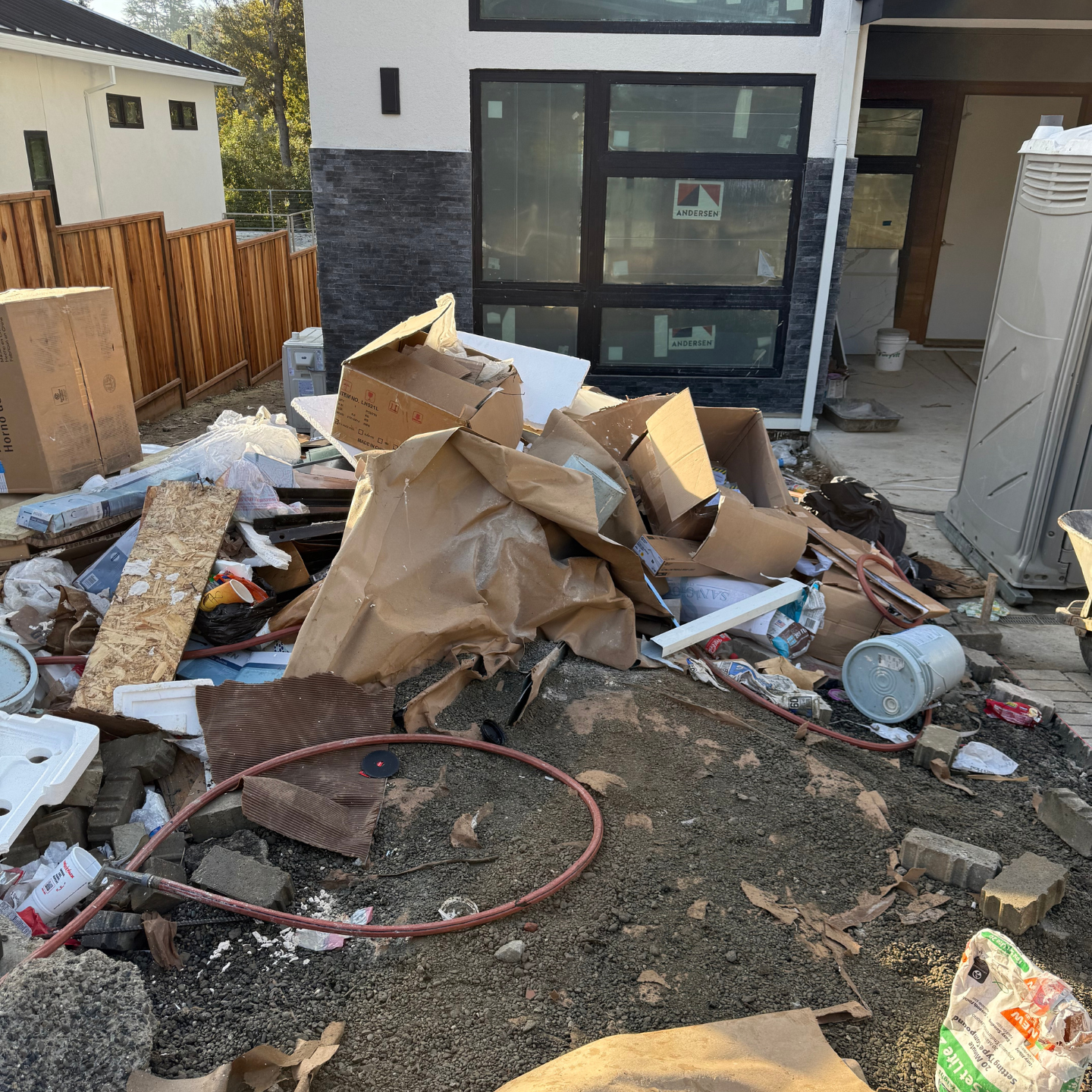 Before junk removal: construction debris pile at job site