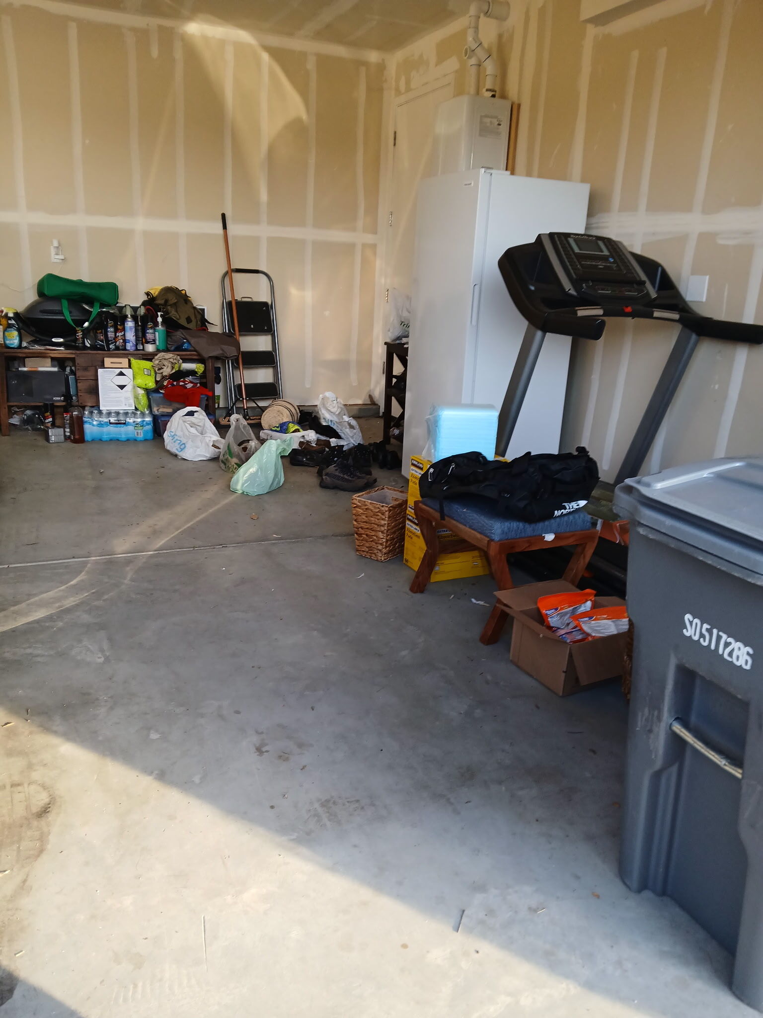 After junk removal: clean and empty two-car garage