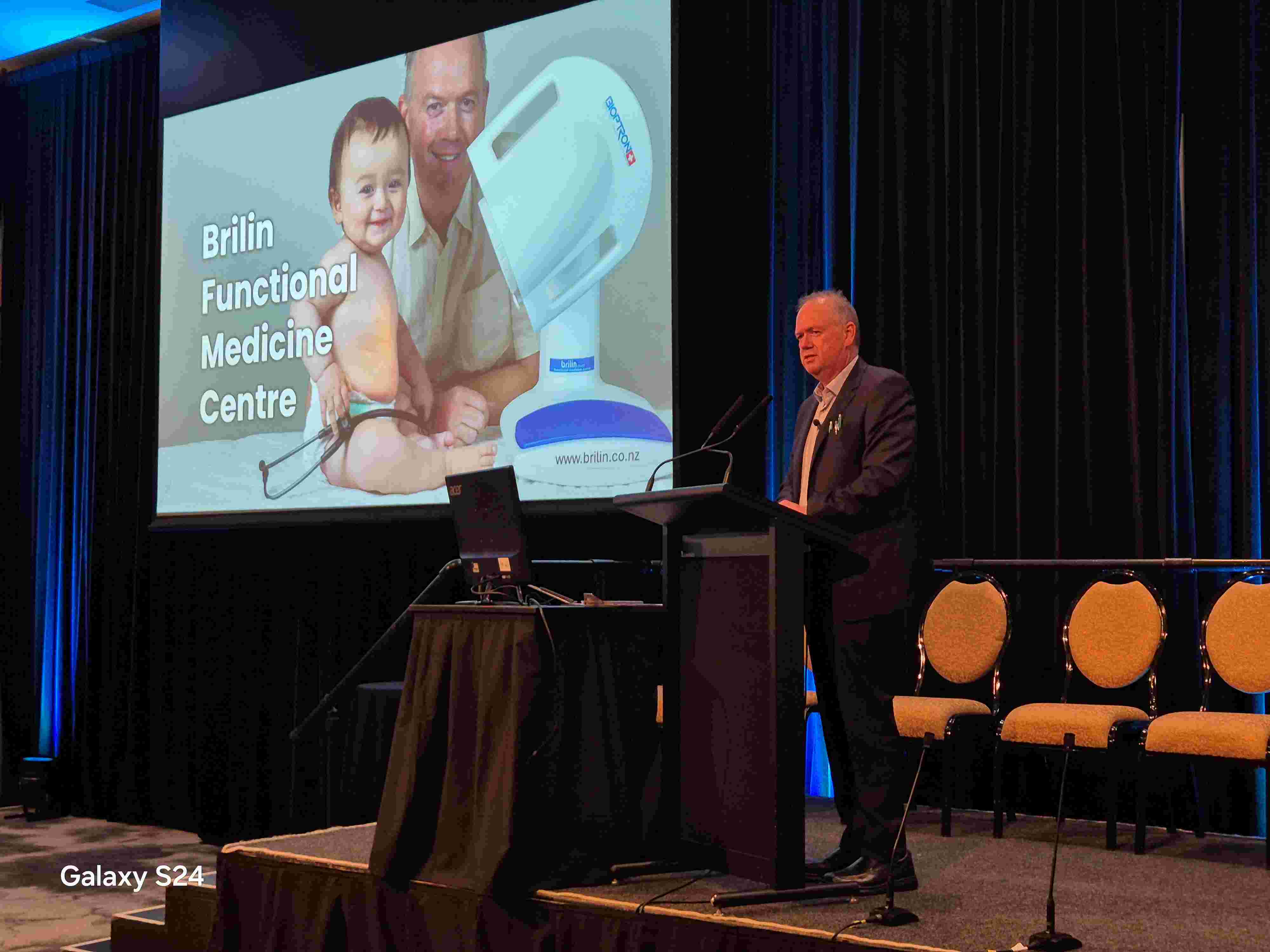 William Bisset speaking to audience