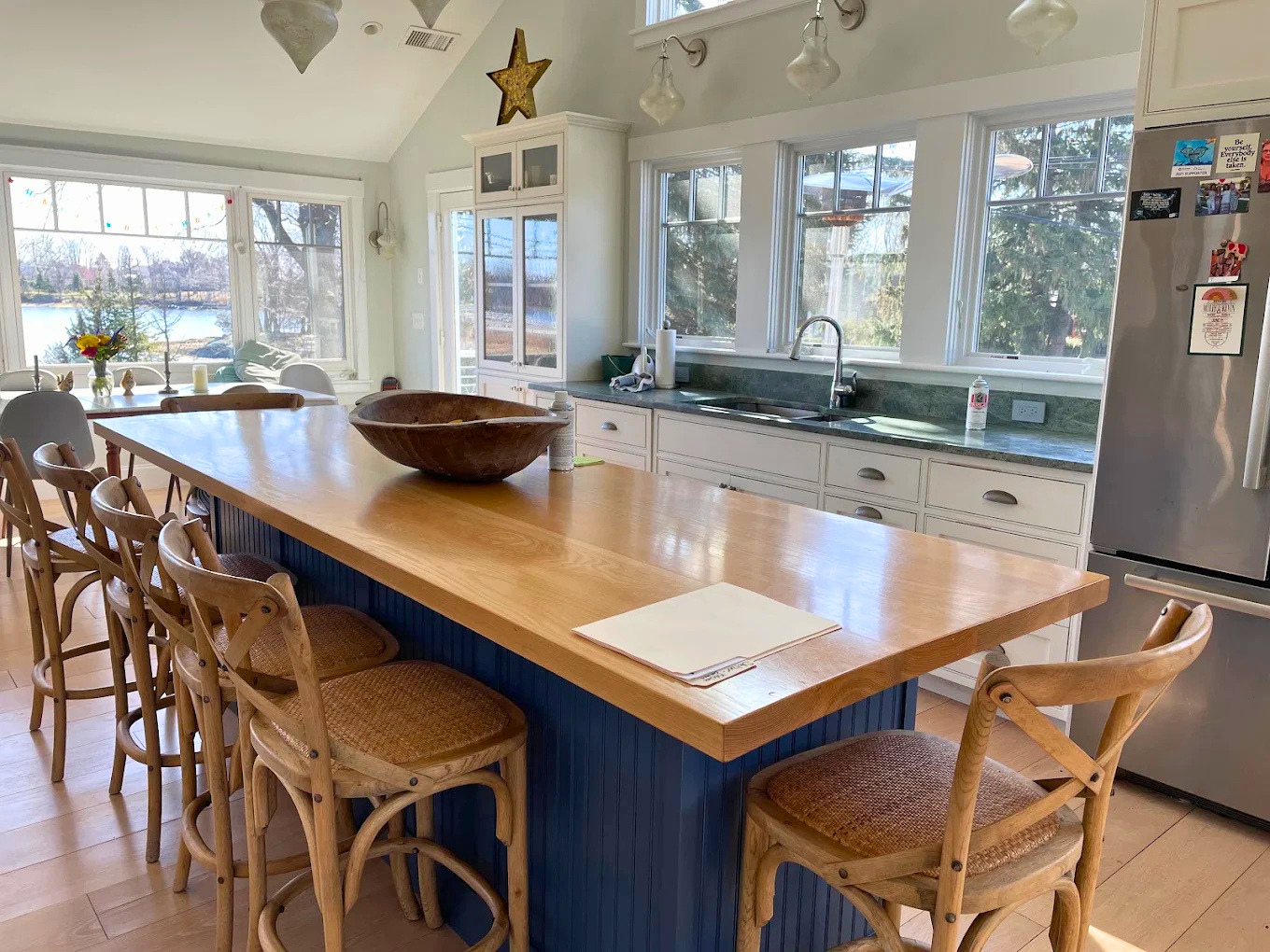 Kitchen cabinet and built-in painting with bright white finishes by Minute Men Painters
