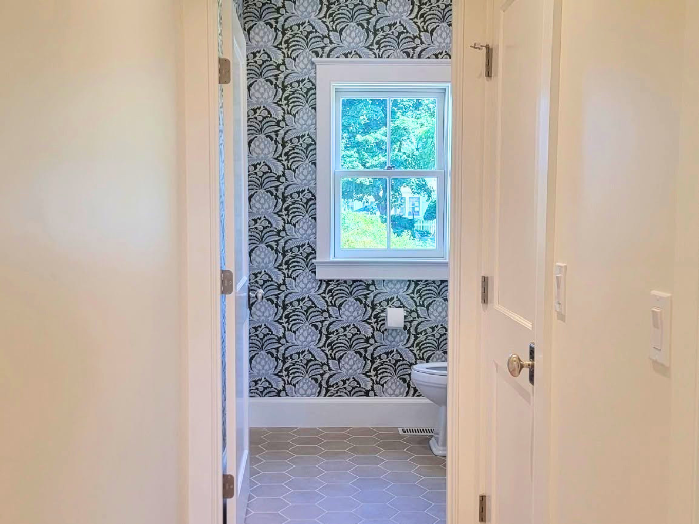 Powder room and hallway interior trim painting in NH Seacoast by Minute Men Painters