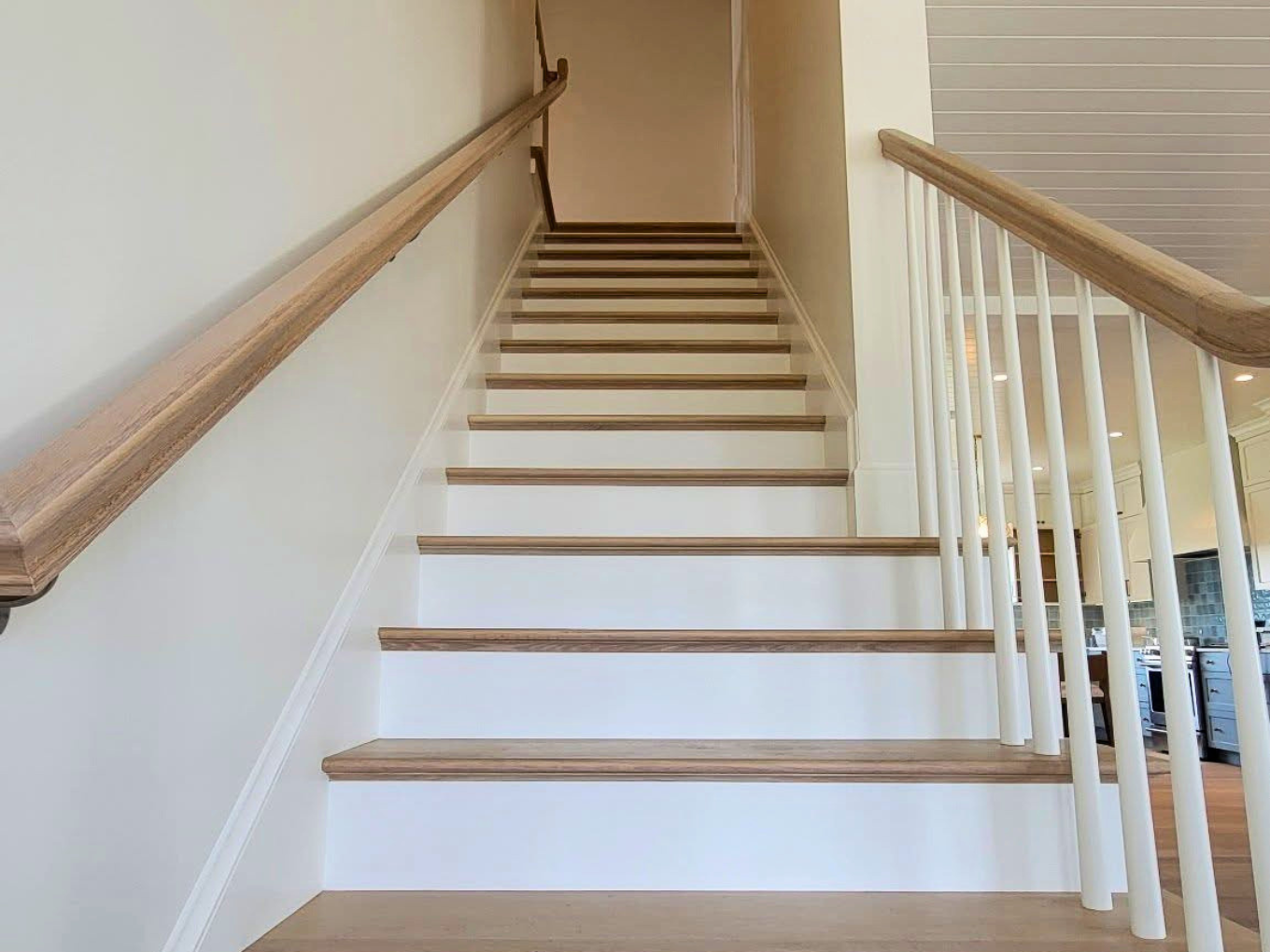 Specialty interior staircase trim and woodwork finishing by Minute Men Painters