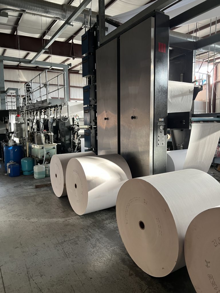 Spools of paper before printing