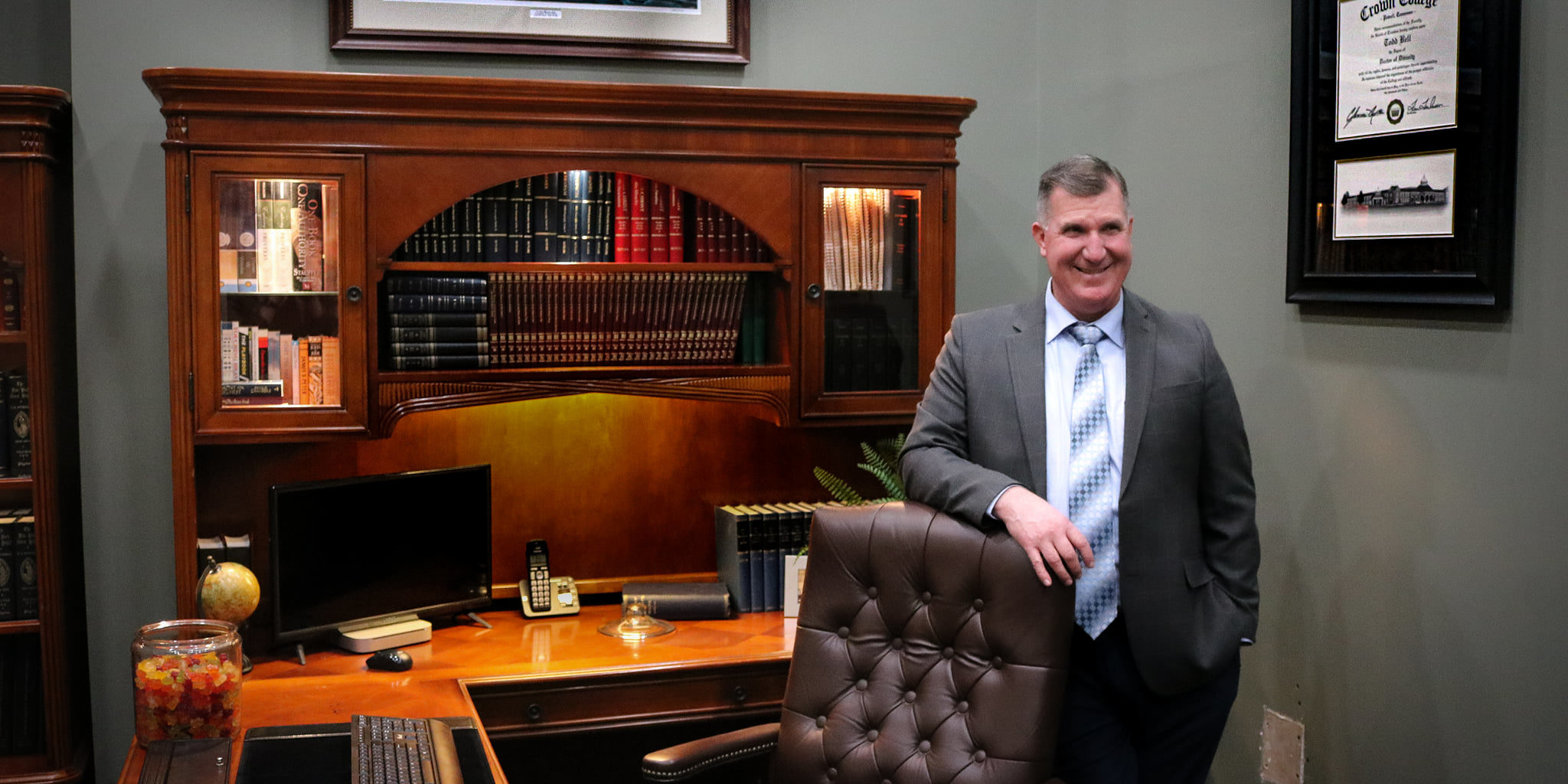 Pastor Bell at desk