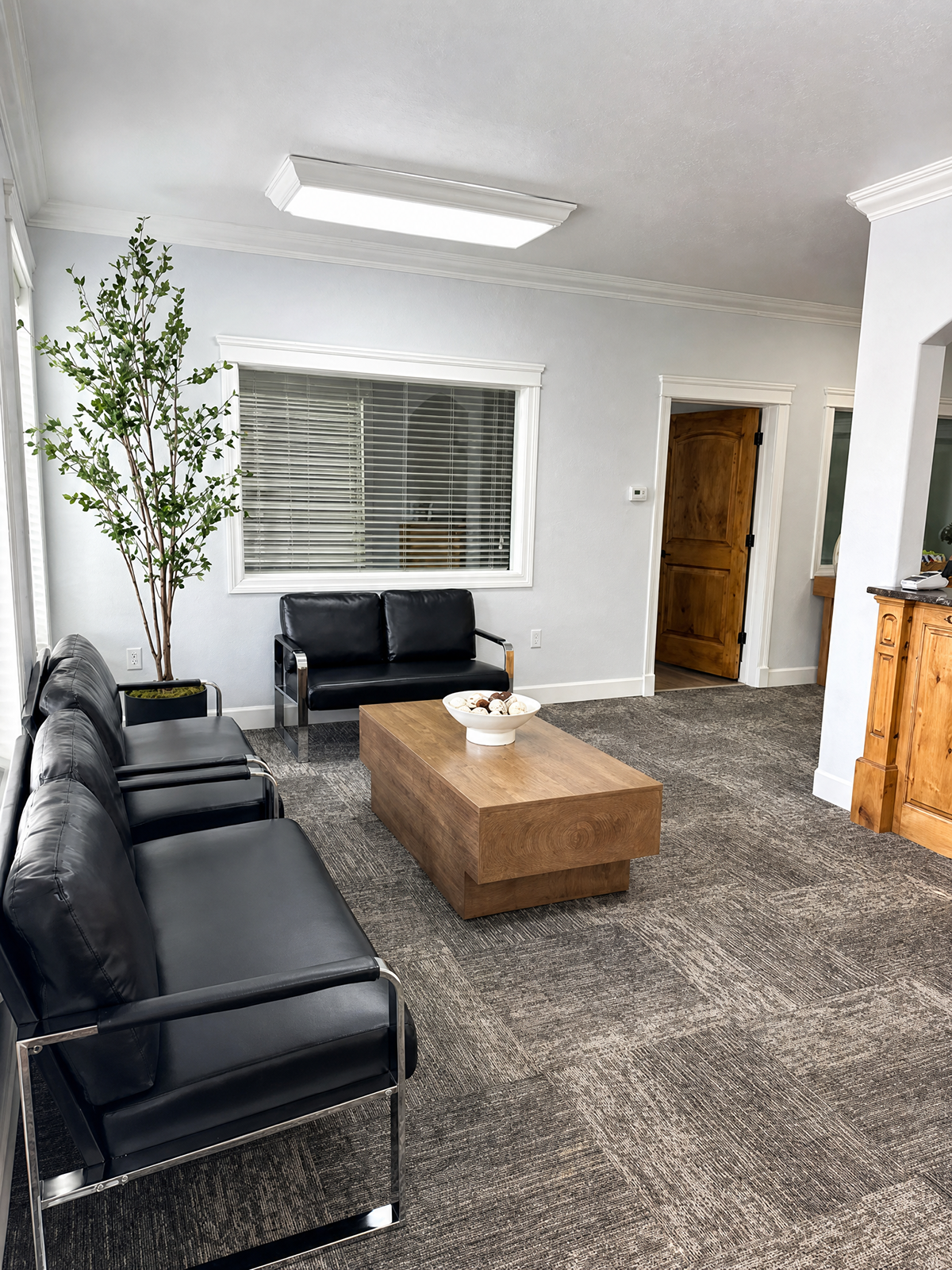 Comfortable waiting area with modern leather seating in Lymphedema Specialty Clinic