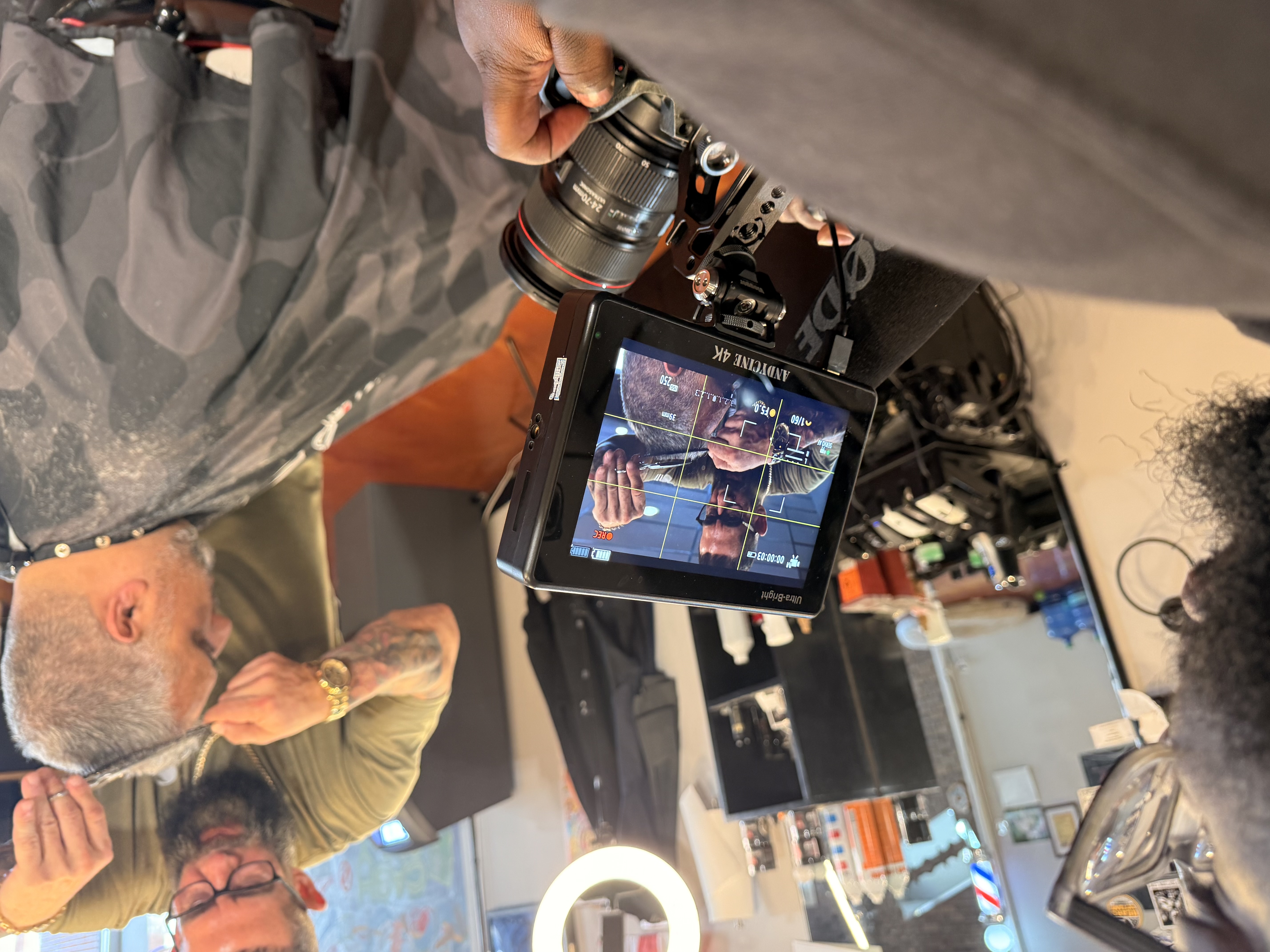 Cinematographer operating a cinema-grade camera during a Rhode Island video production
