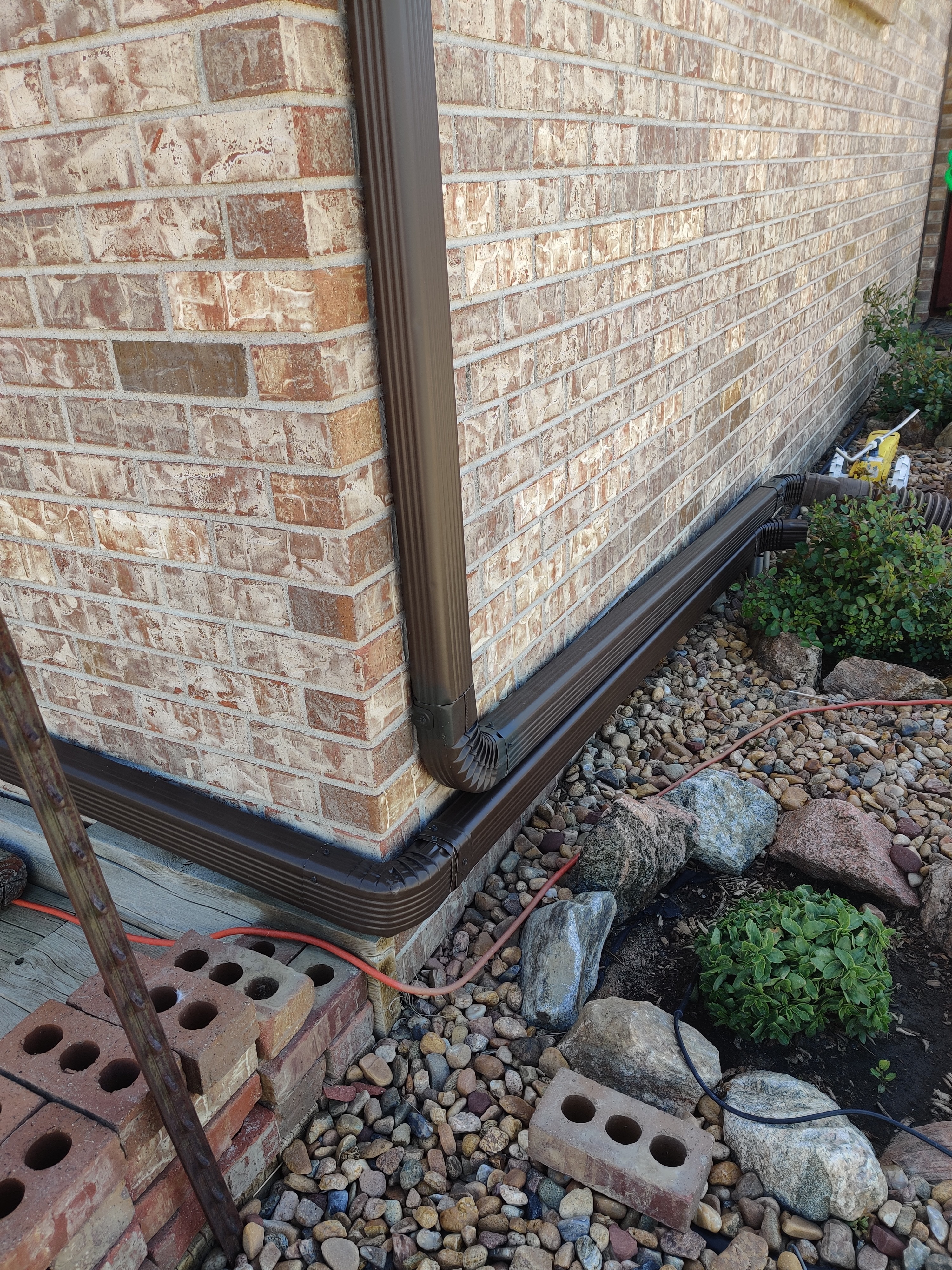 Gutter downspout installation and repair