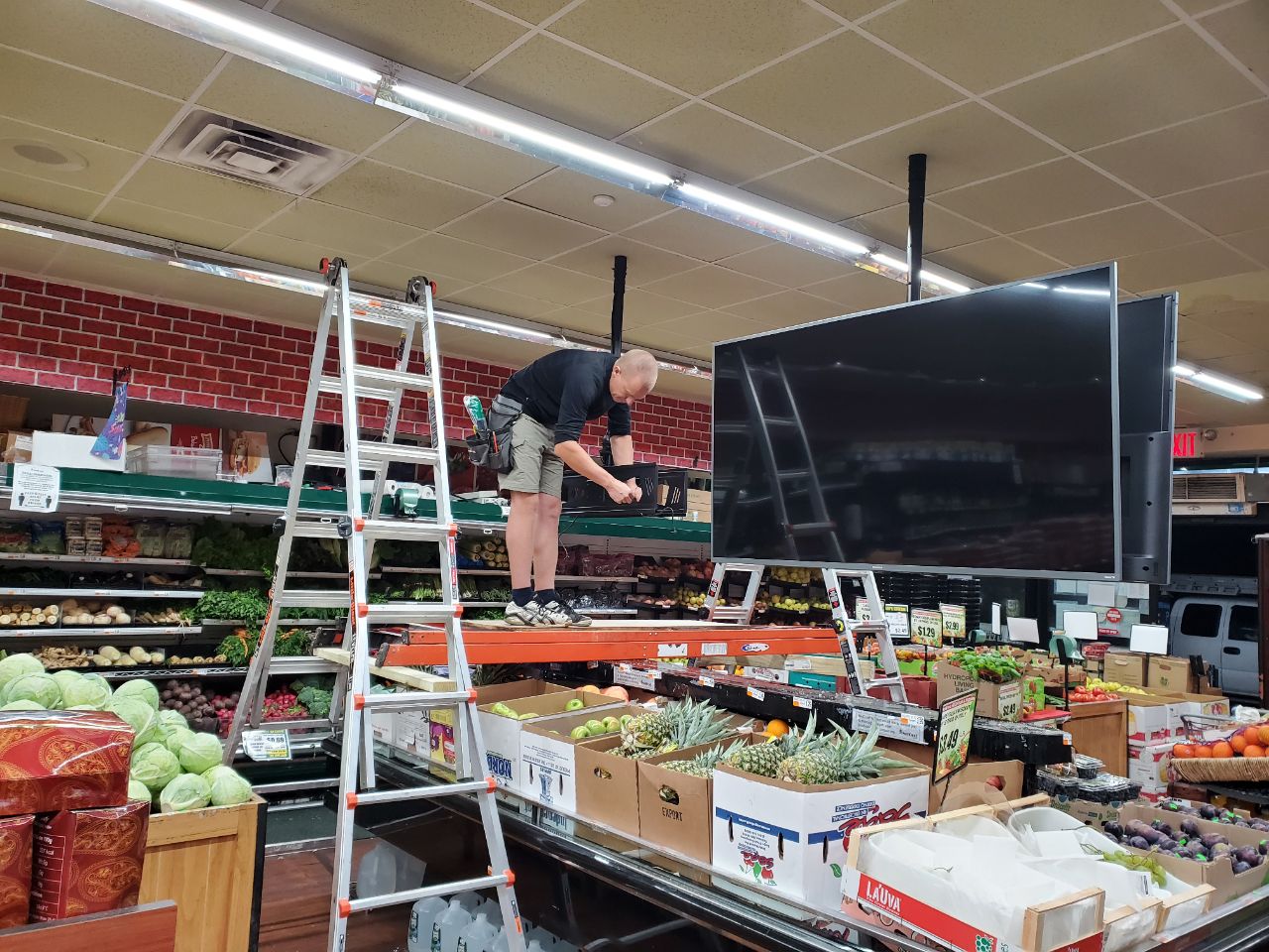 Commercial TV mounting and display setup