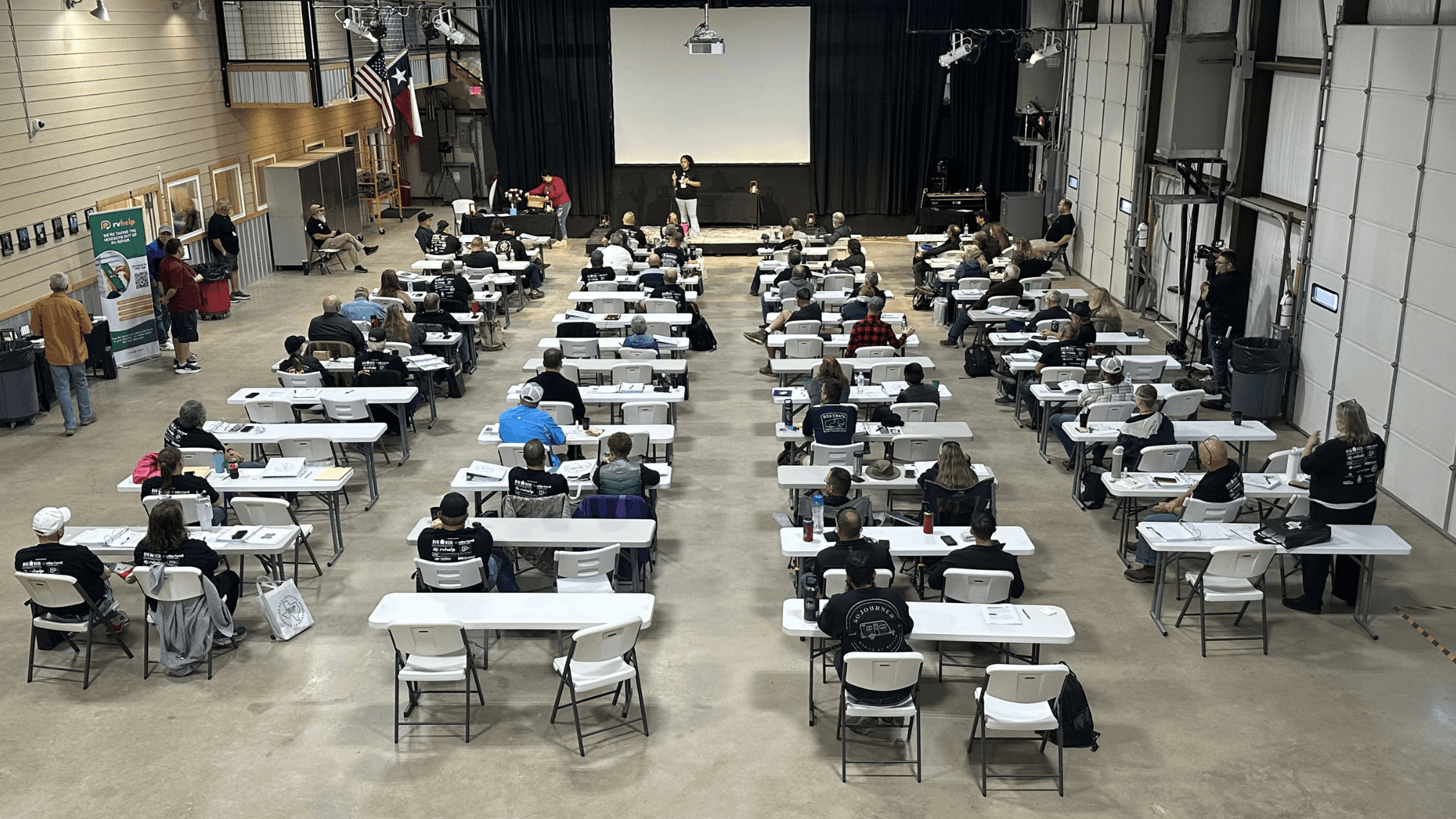 Business owners attending a national industry marketing presentation