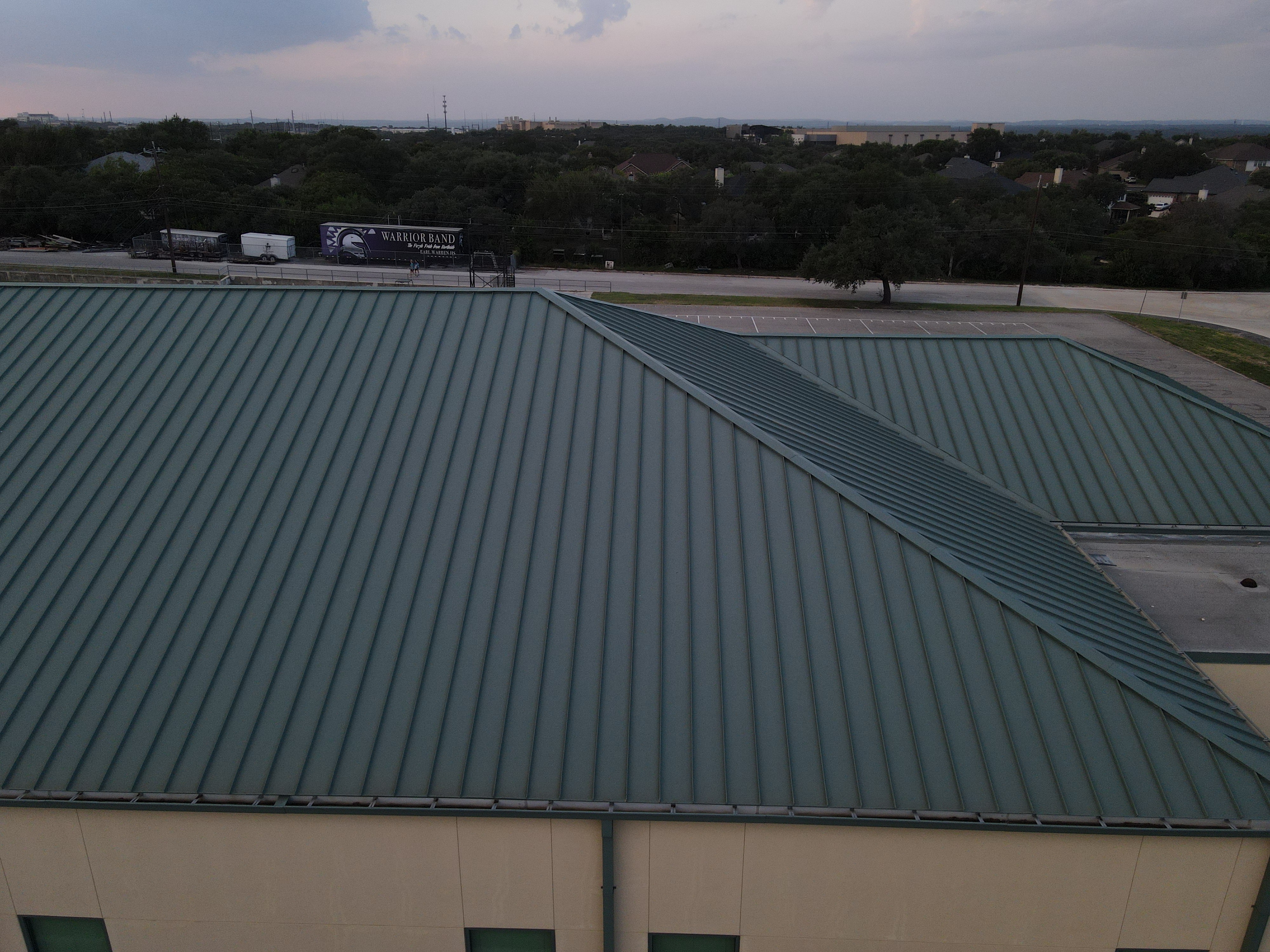 San Antonio commercial building green metal roof drone inspection aerial view Bexar County Texas industrial facility