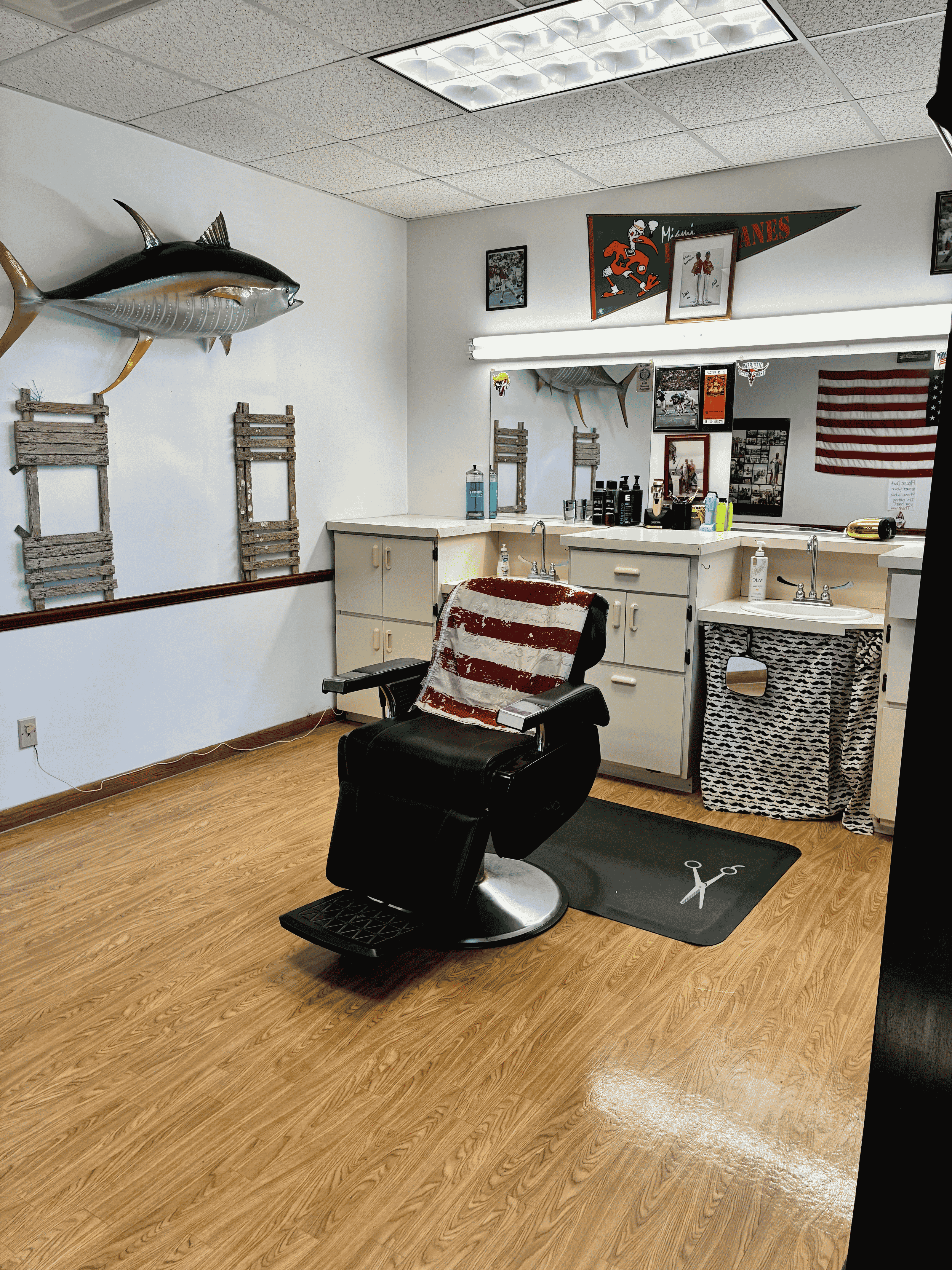 Inside Franks Family Barbershop Melbourne FL — classic barber chairs and shop interior