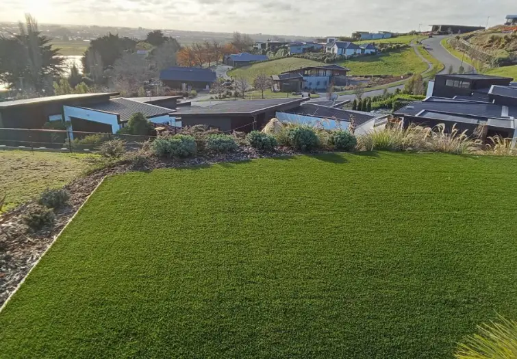 Beautifully maintained lawn and property overlooking a valley