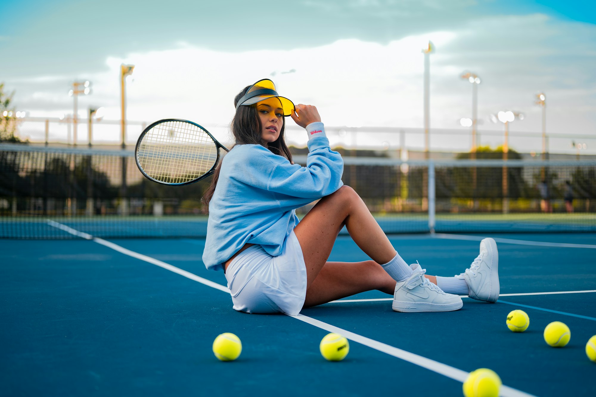 Playing tennis at ocean-view public courts