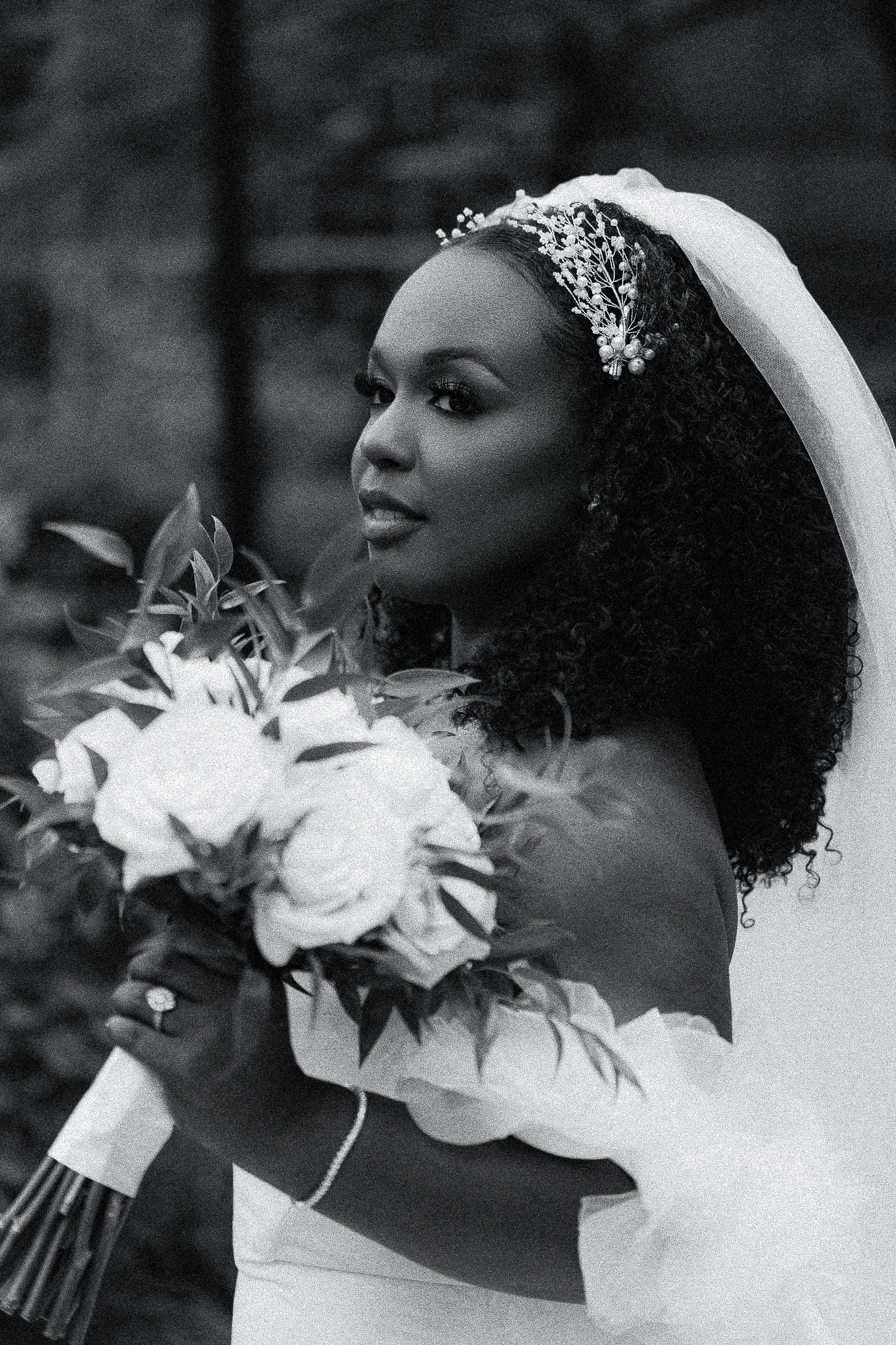 Black bride with bridal makeup, natural hair styling, and veil by Nicki Rouge Brands Chicago