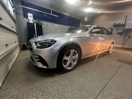 Detailing studio bay with epoxy flooring and LED lighting