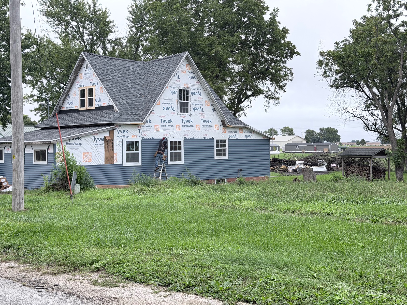 Two-Story Farmhouse Siding In Progress