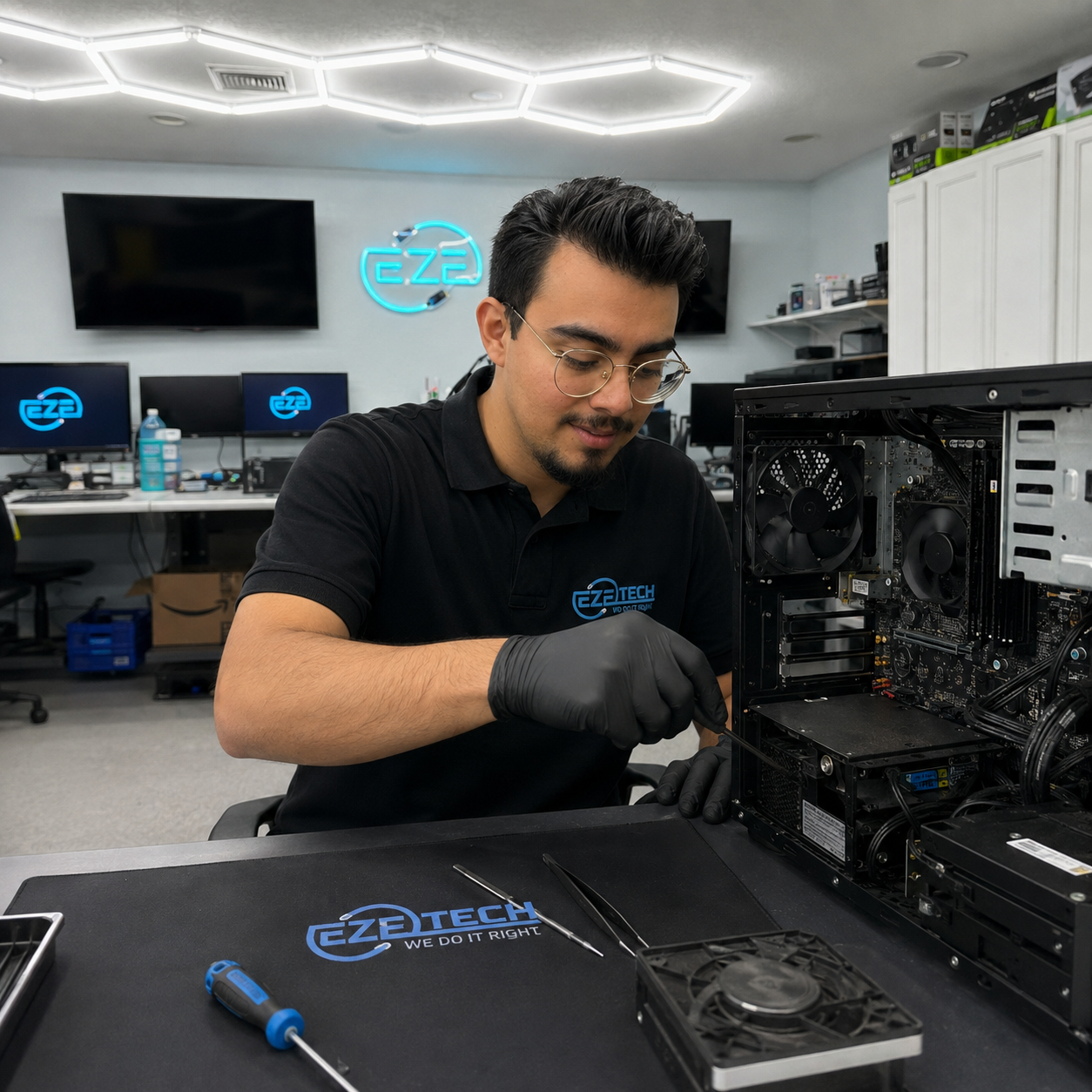 EZETech technician explaining computer repair to a customer with clear communication