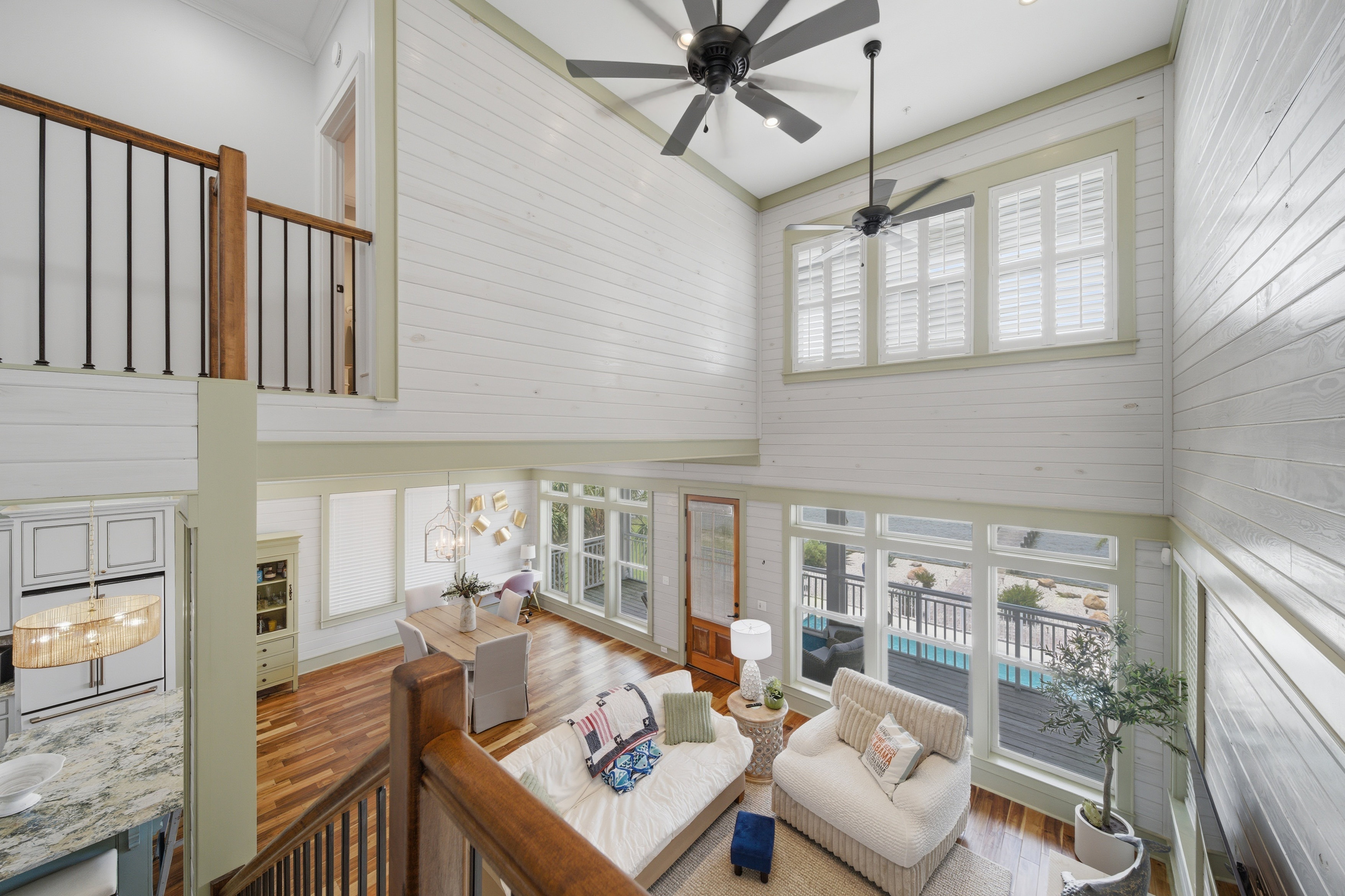 High angle view of living and dining area from the stairs