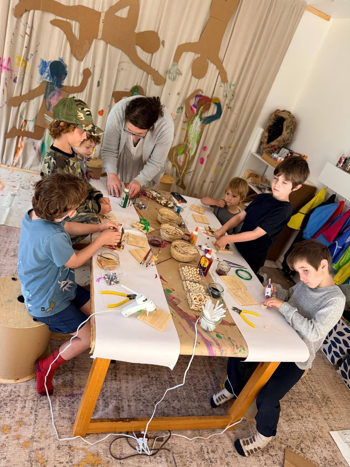 Children creating art at the open atelier