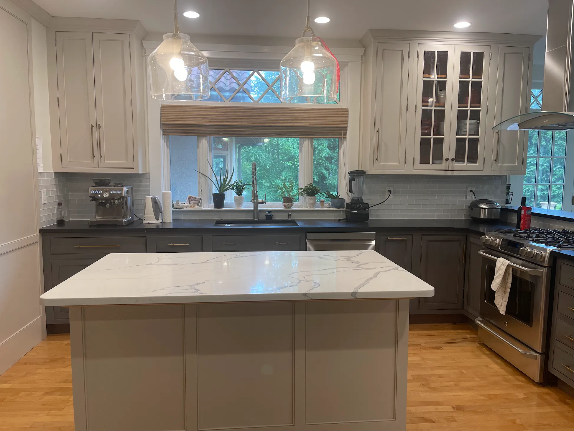 Painted kitchen cabinets in two-tone gray and white