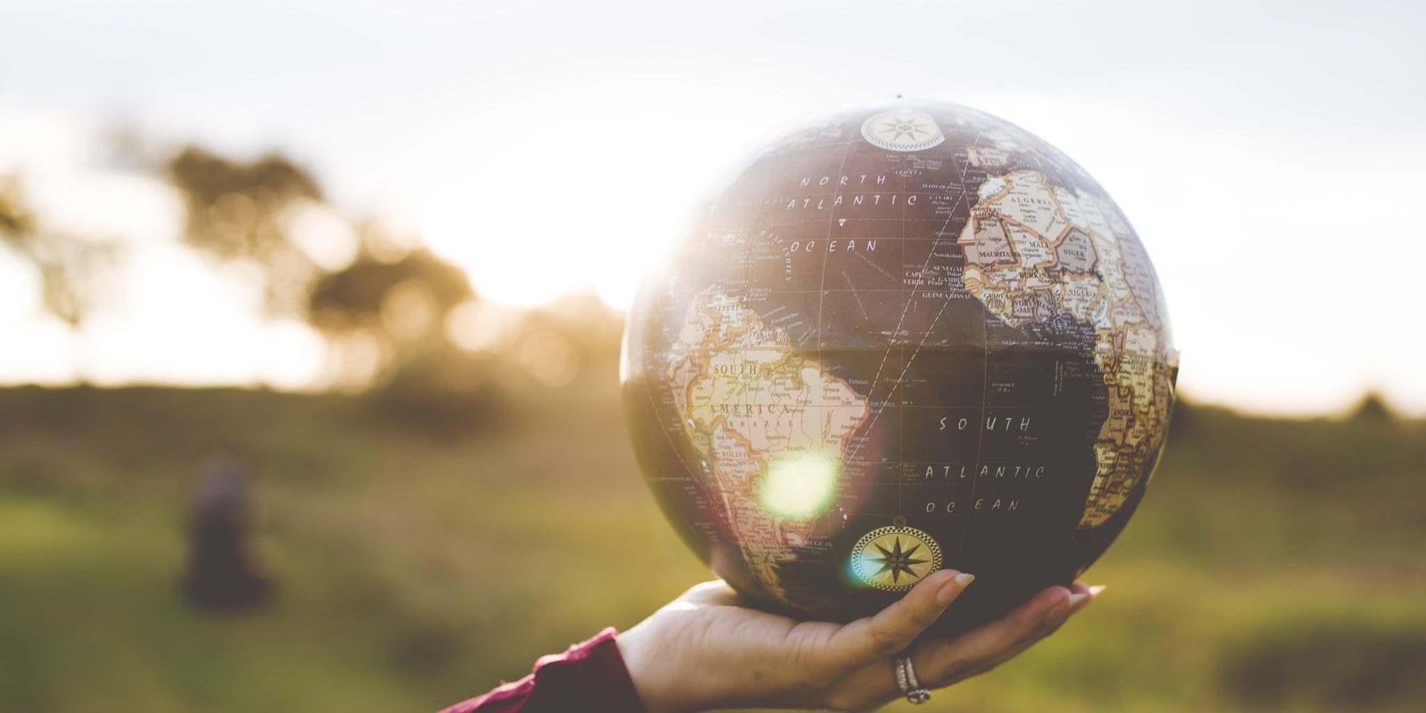 Globe in hands