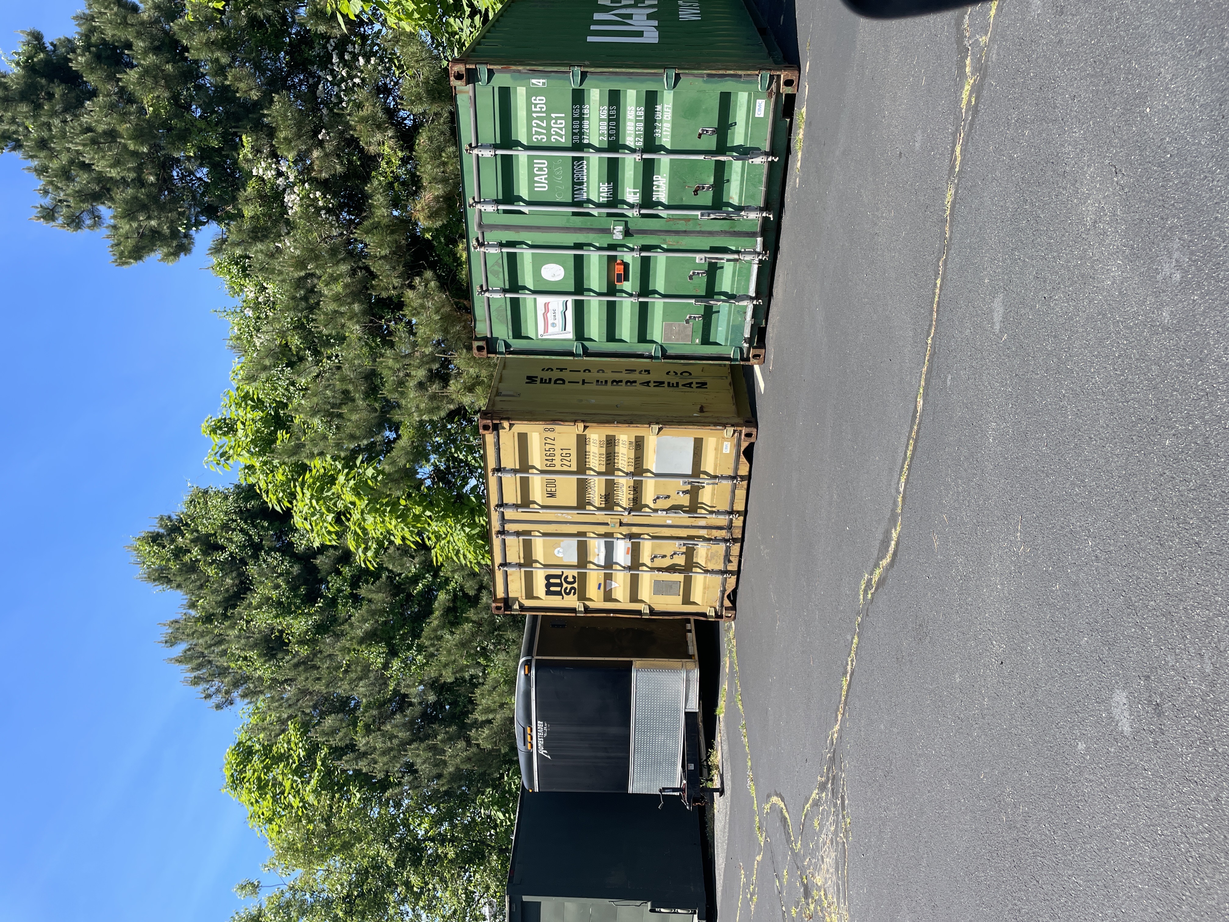 Storage containers and trailer staged for cleanout in Farmingville NY