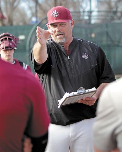 Coach Skip Hanks coaching on the diamond