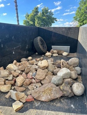 Rocks and debris hauled out during property cleanout