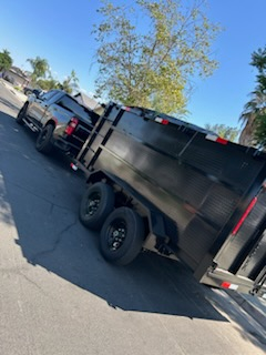 PC Junk Removal dump trailer parked and ready for job